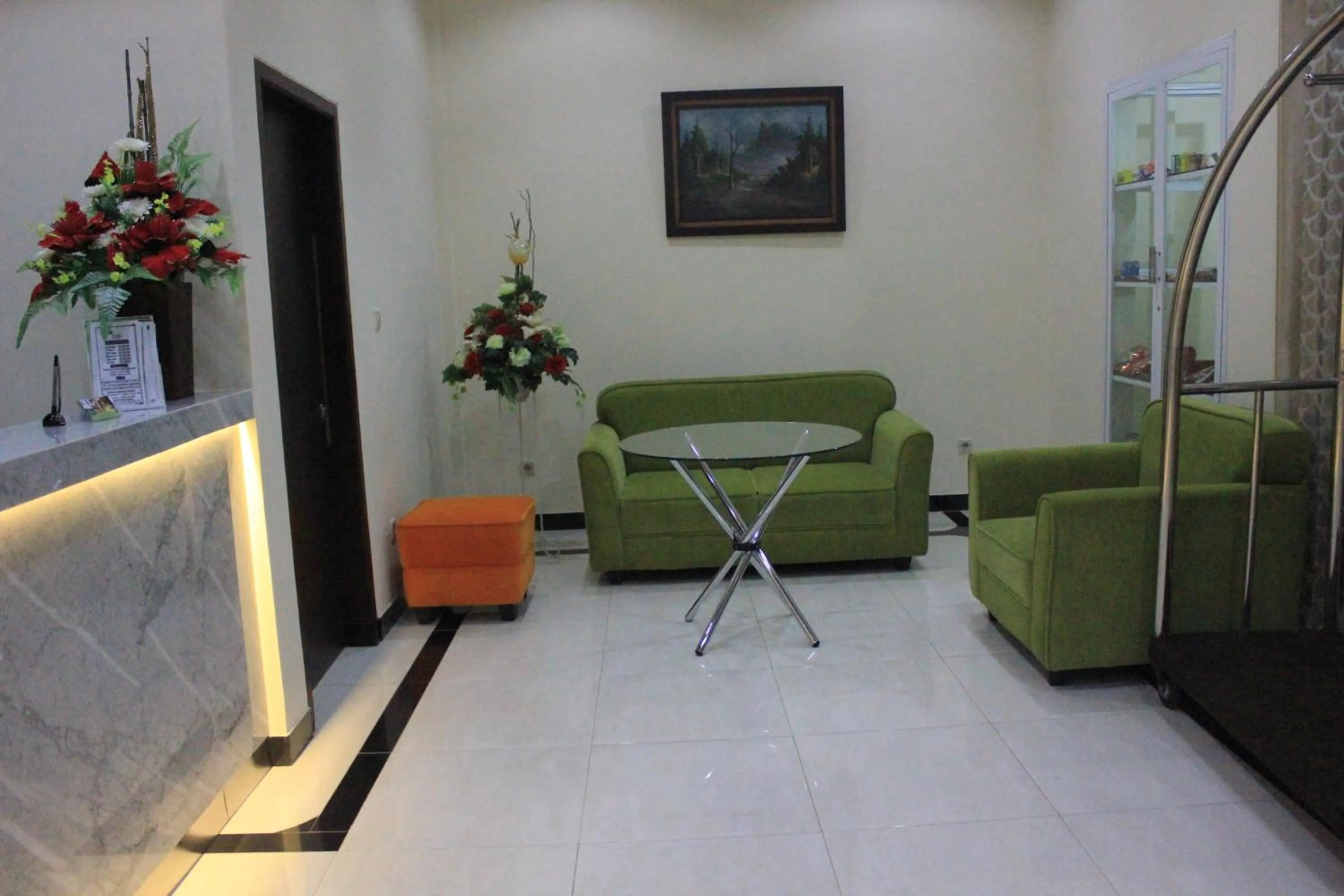 Communal lounge/ TV room in Green Garden Hotel
