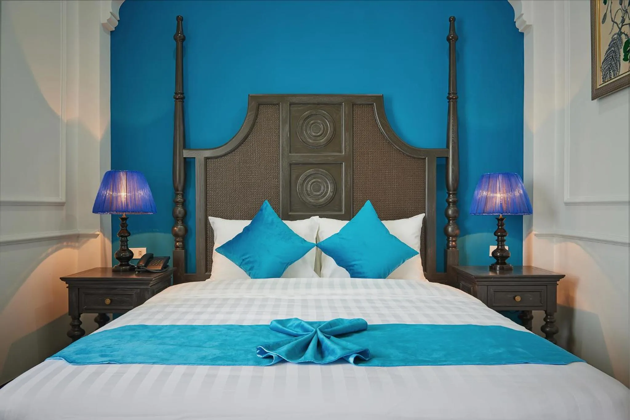 Bed in Manoir Des Arts Hotel