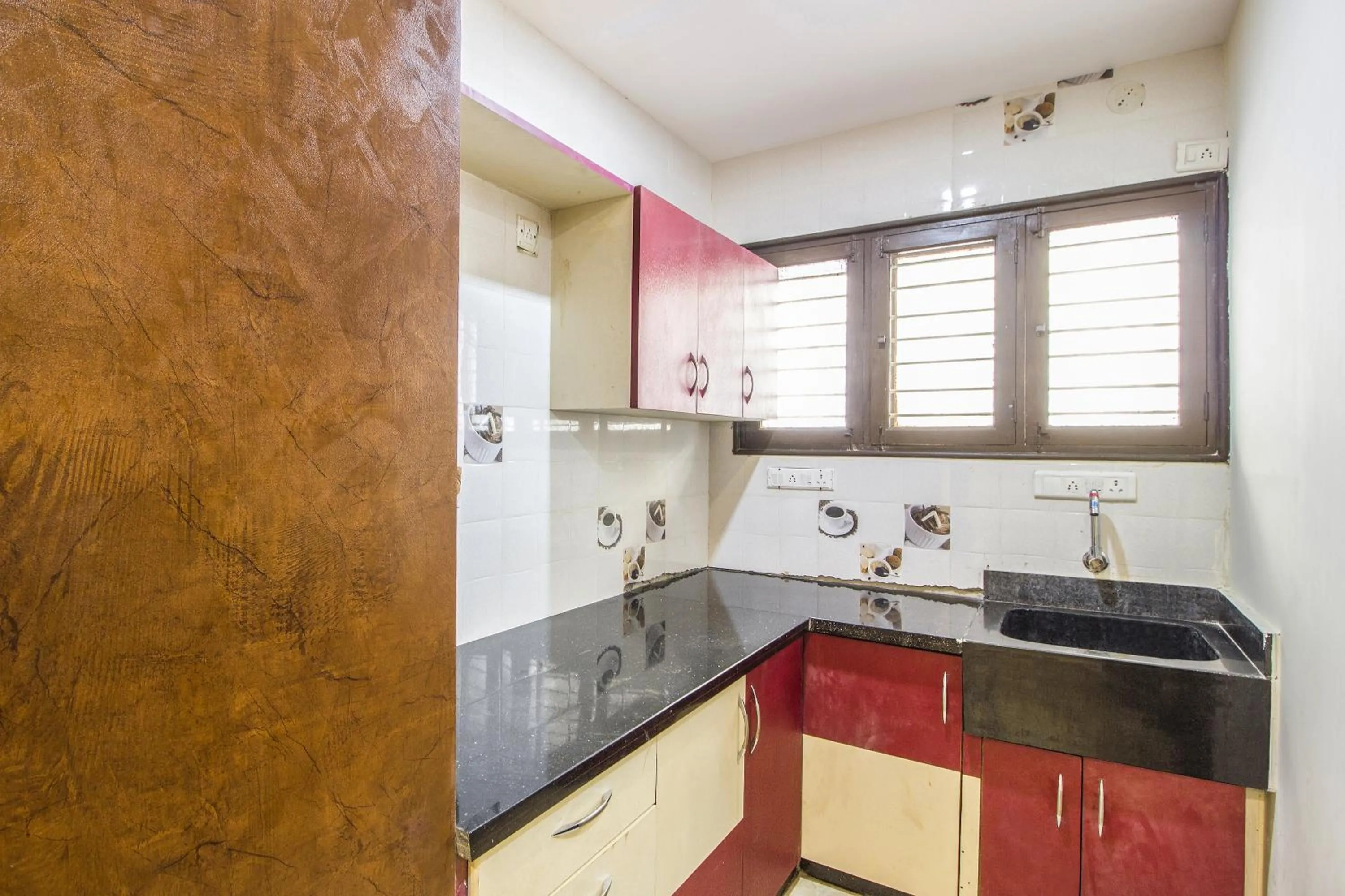 Kitchen or kitchenette in FabHotel Crown Suites - Nr Sony Signals