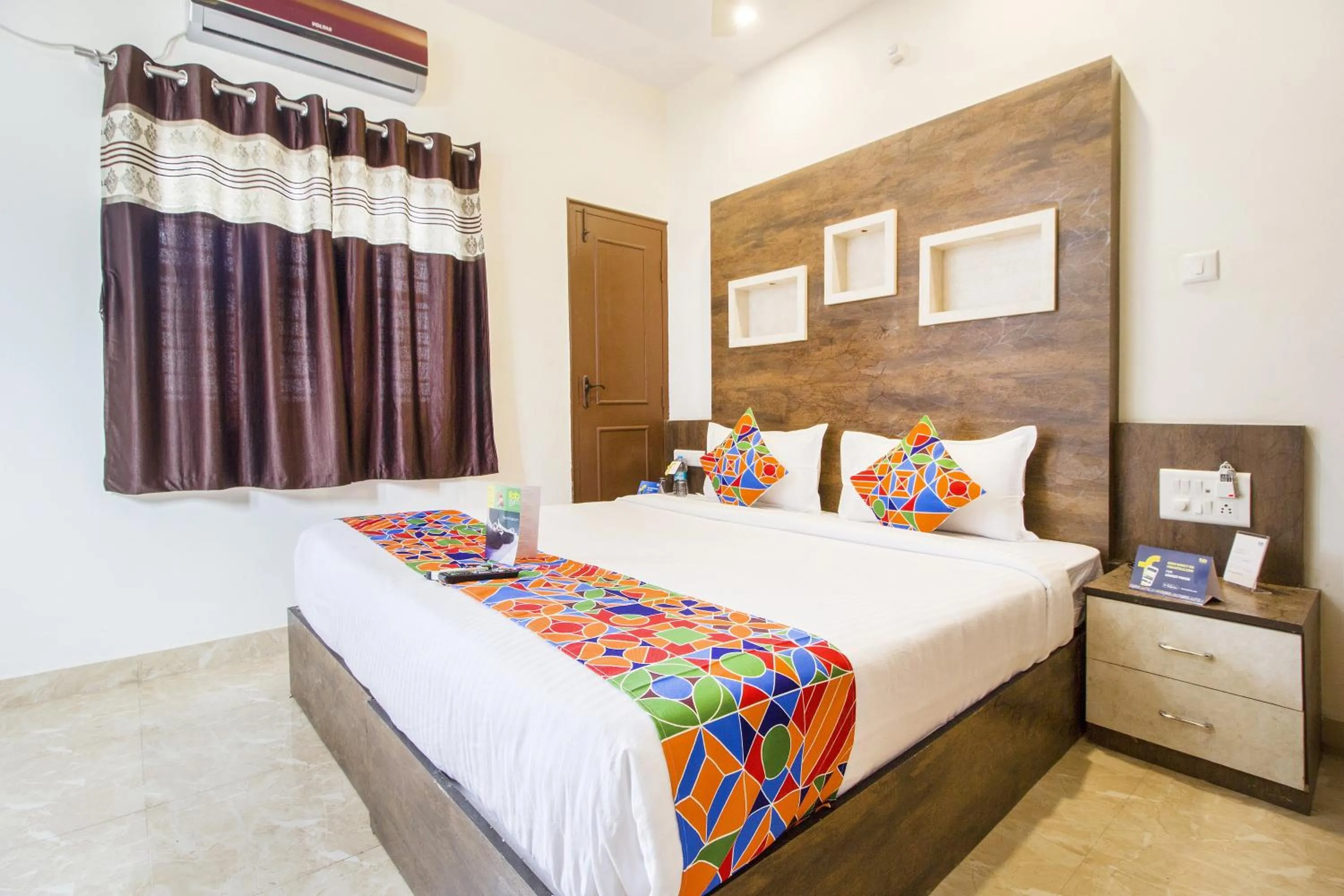 Bed in FabHotel Crown Suites - Nr Sony Signals