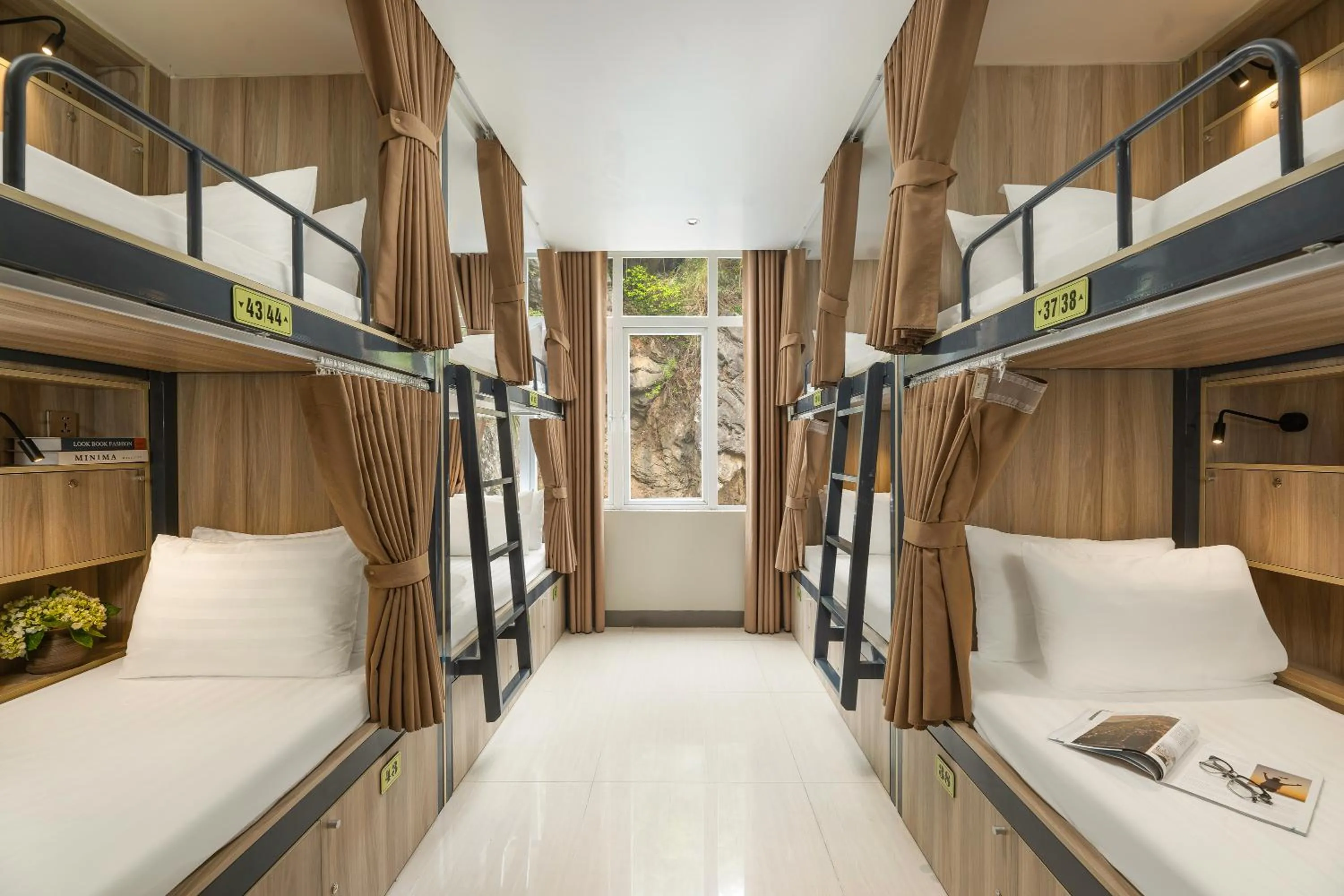 Property building, Bed in The Oversleep Catba Hostel & Pool Bar