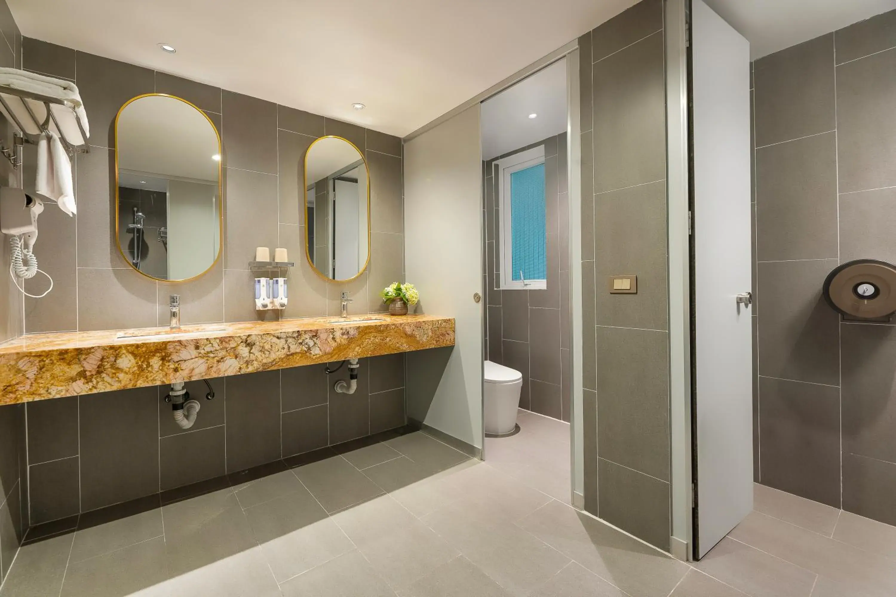 Bathroom in The Oversleep Catba Hostel & Pool Bar Bathroom in The Oversleep Catba Hostel & Pool Bar