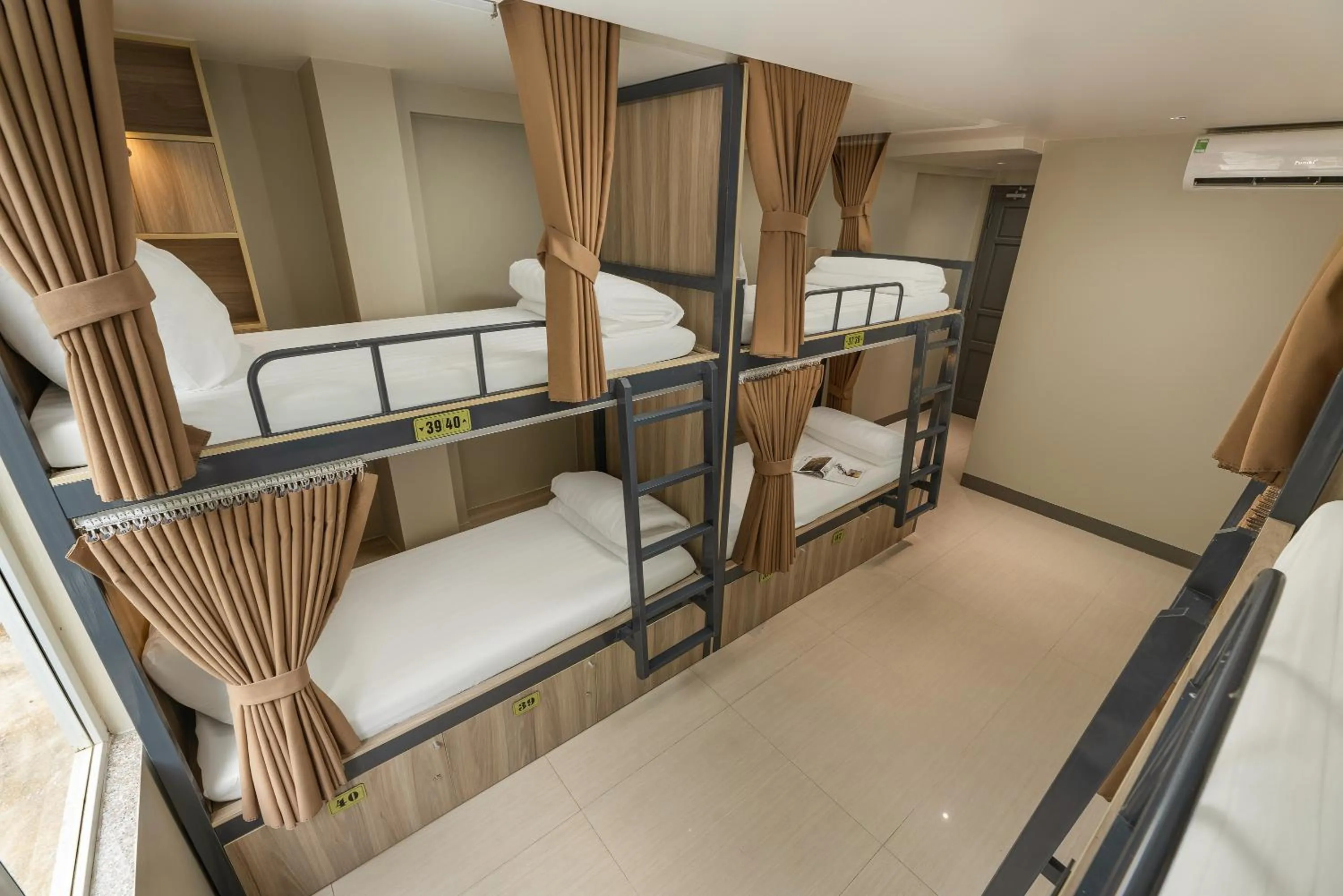 Property building, Bed in The Oversleep Catba Hostel & Pool Bar