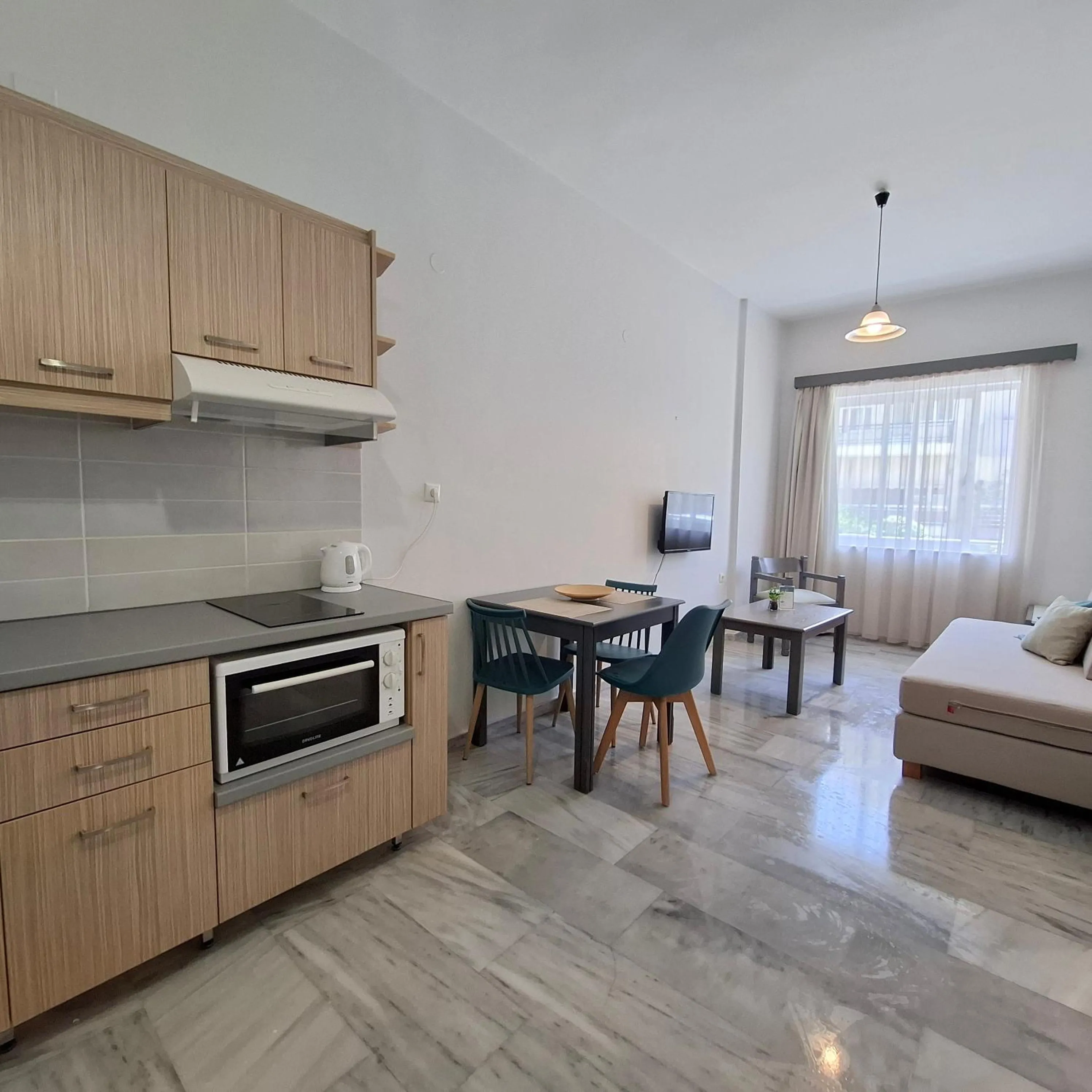 Kitchen or kitchenette in Mardinik Hotel Apartments
