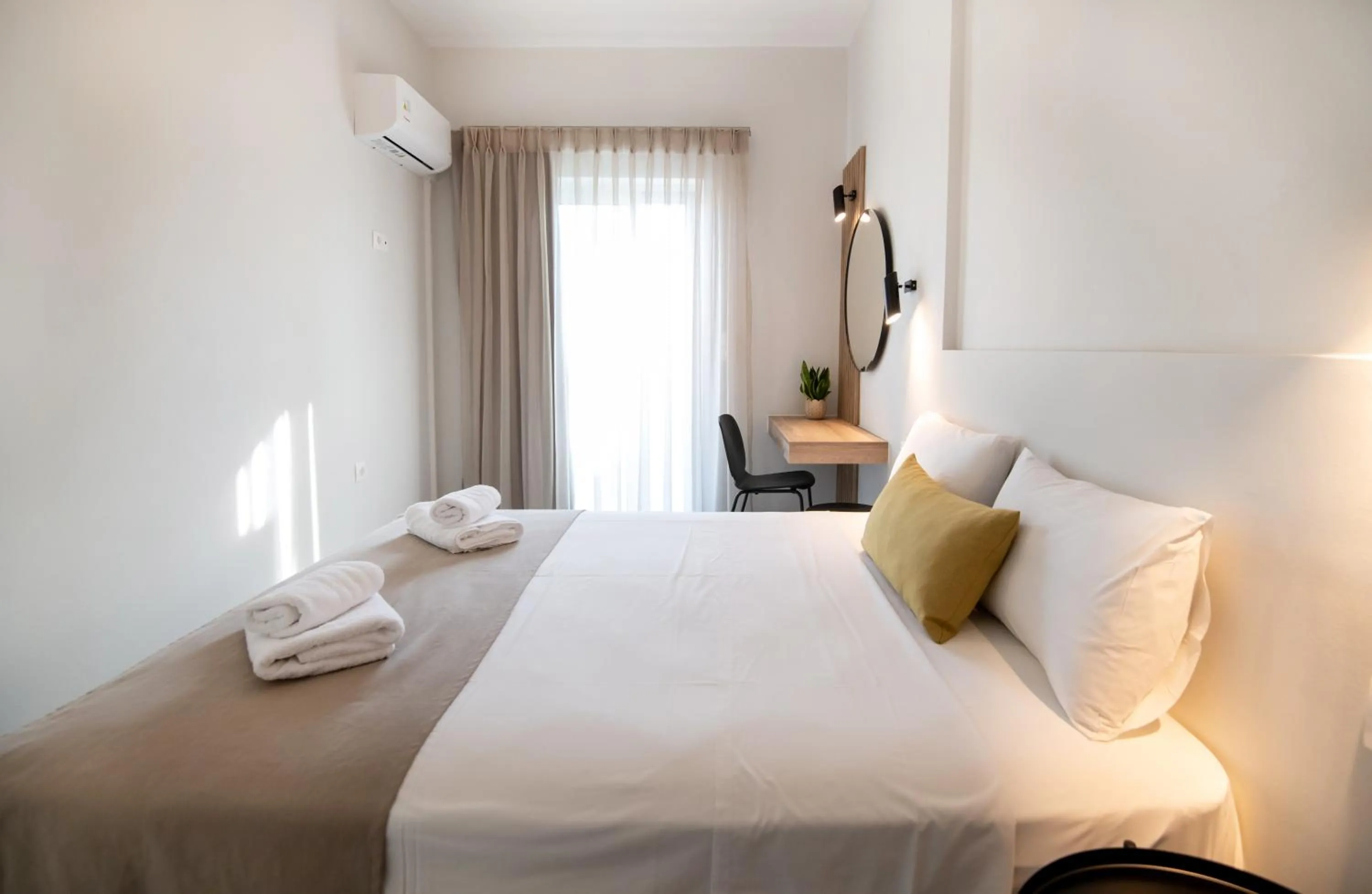 Bed in Mardinik Hotel Apartments