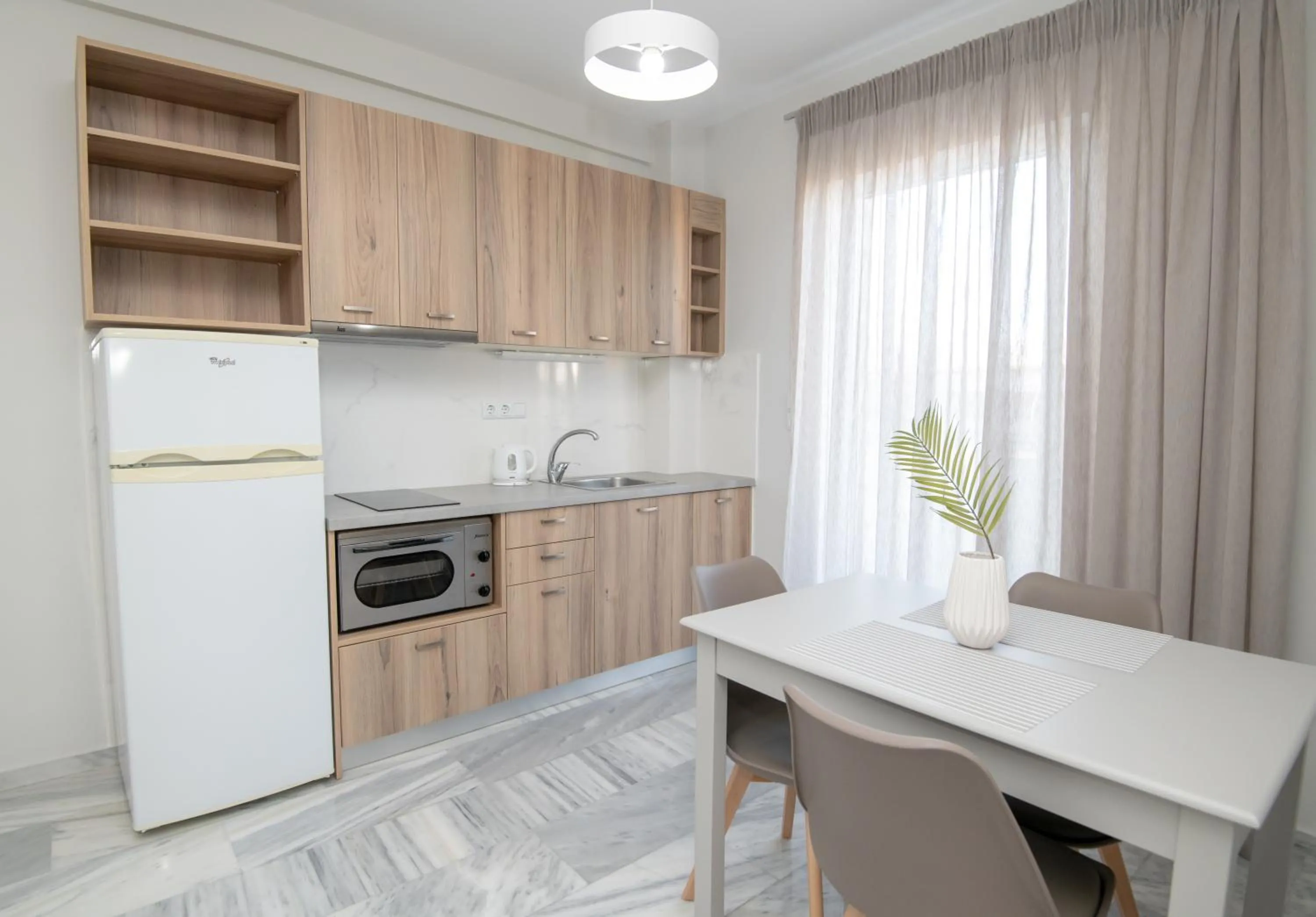 Kitchen or kitchenette in Mardinik Hotel Apartments