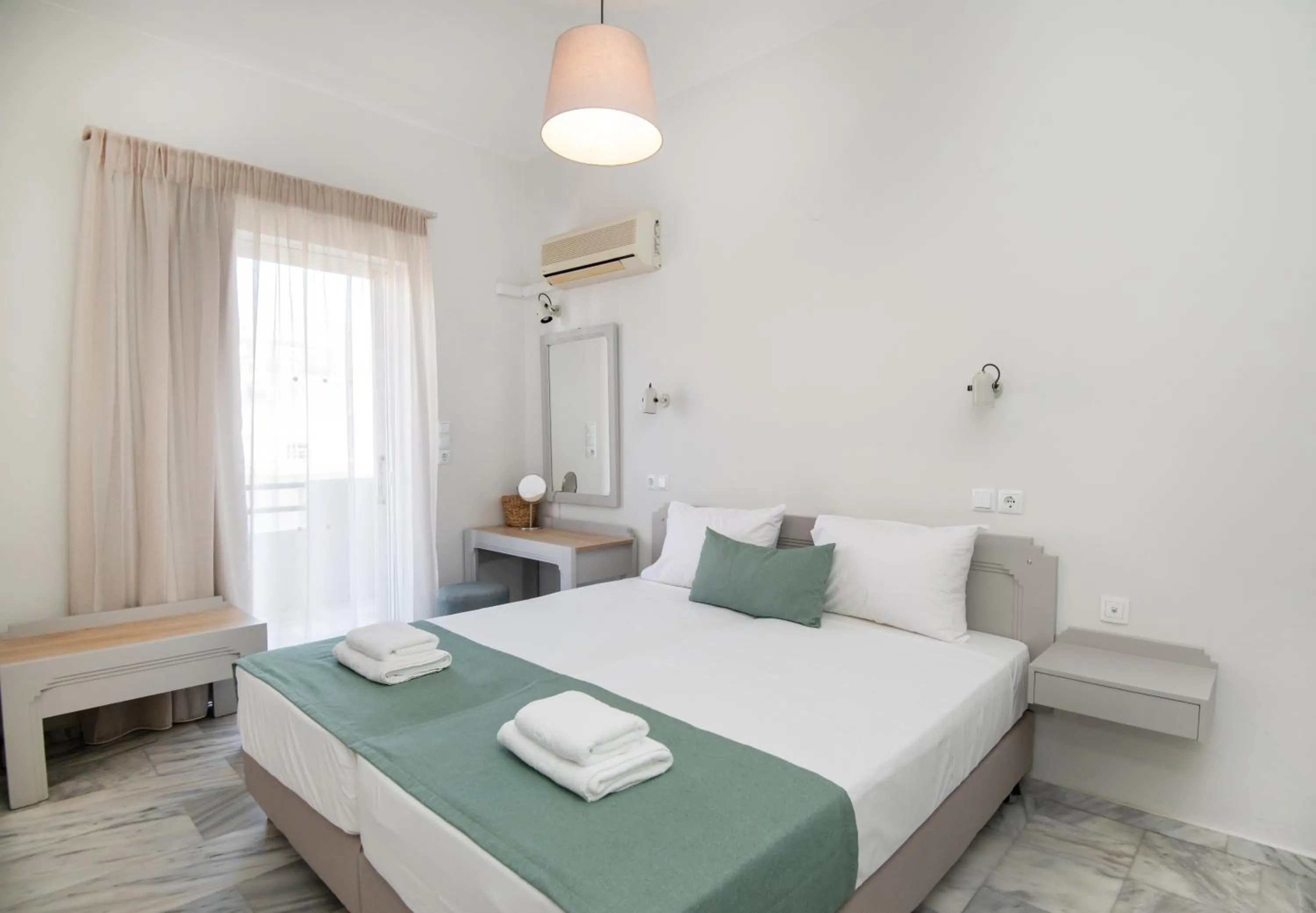 Bed in Mardinik Hotel Apartments