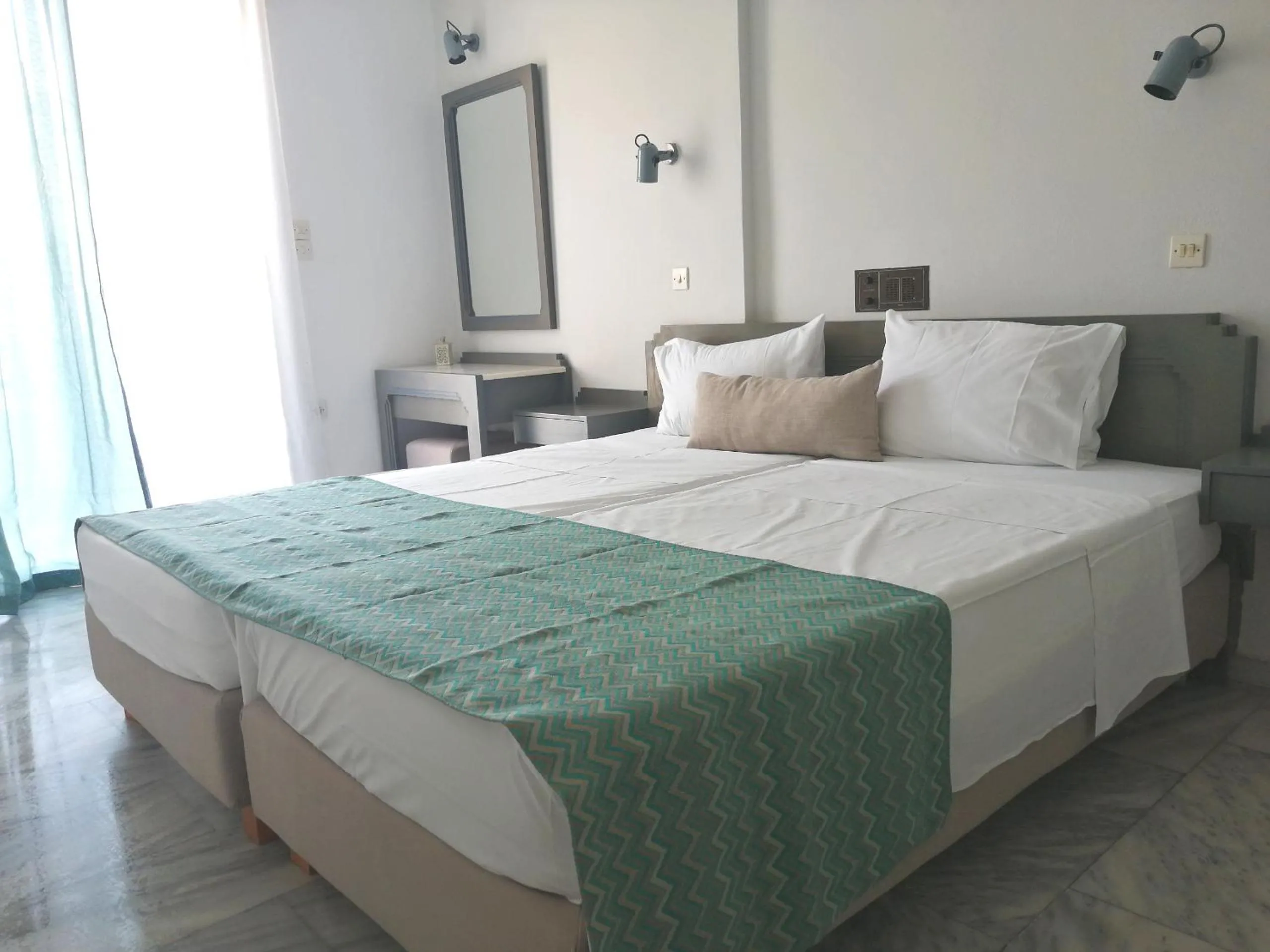 Bed in Mardinik Hotel Apartments