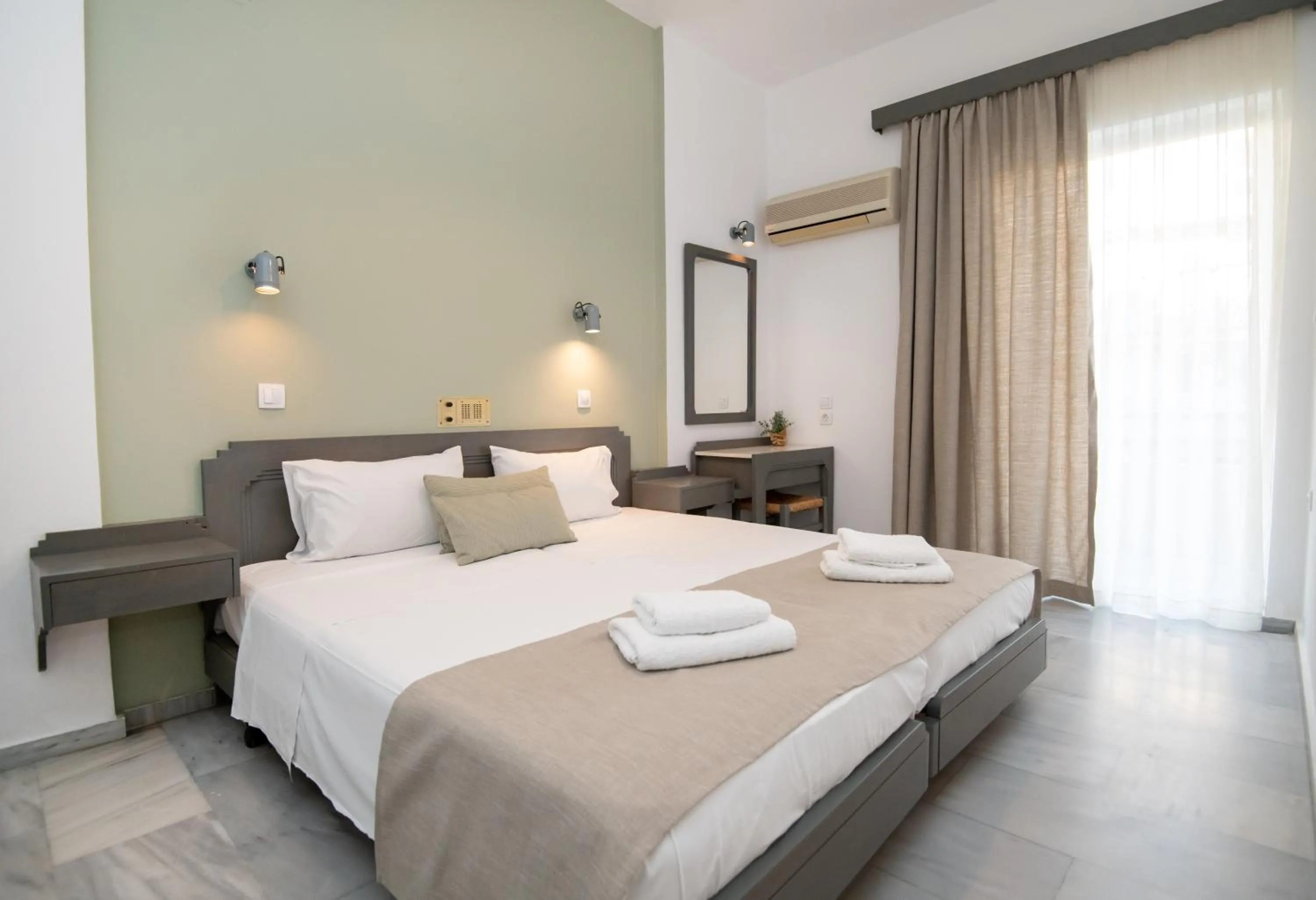 Bed in Mardinik Hotel Apartments