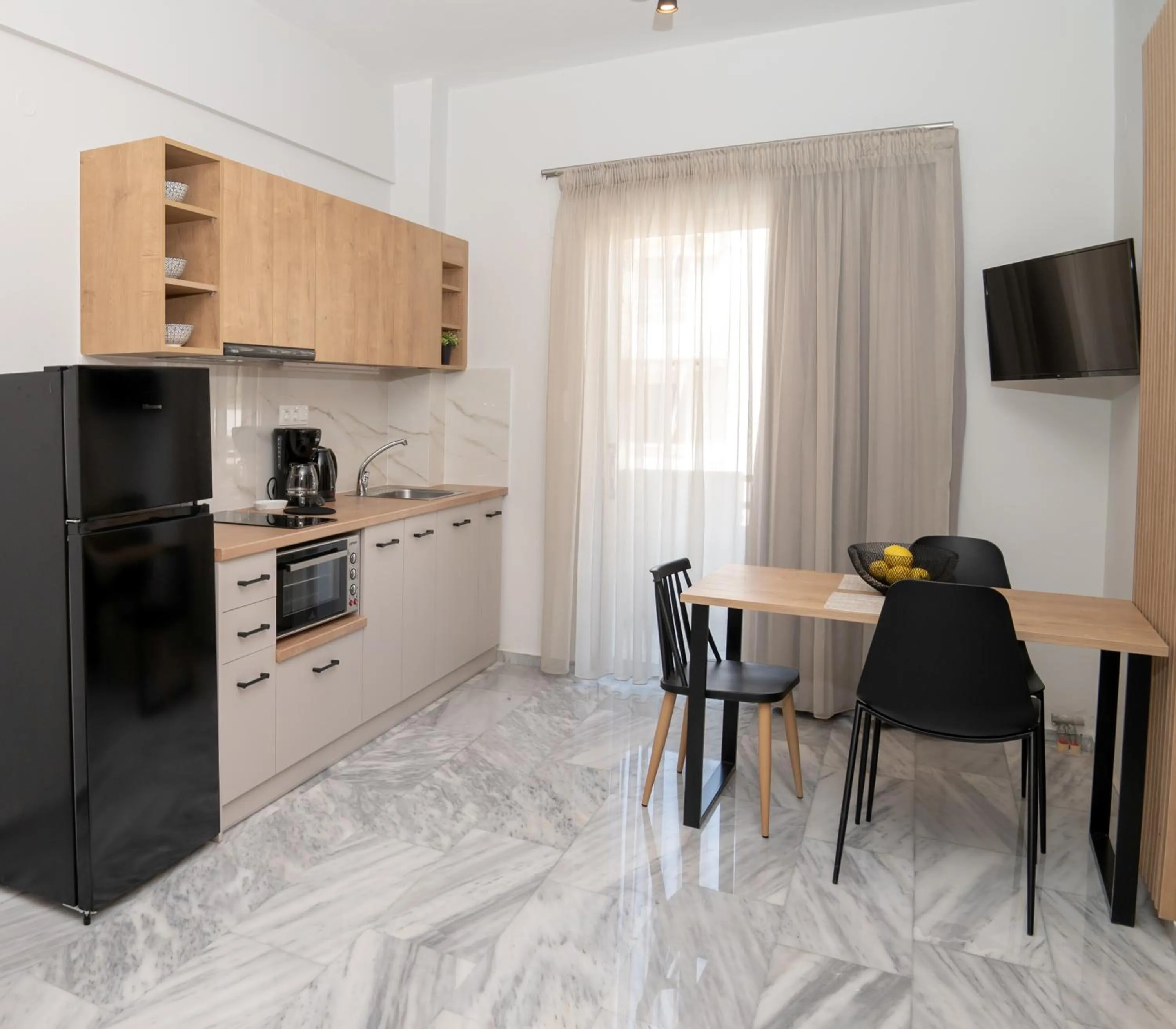 Dining area in Mardinik Hotel Apartments