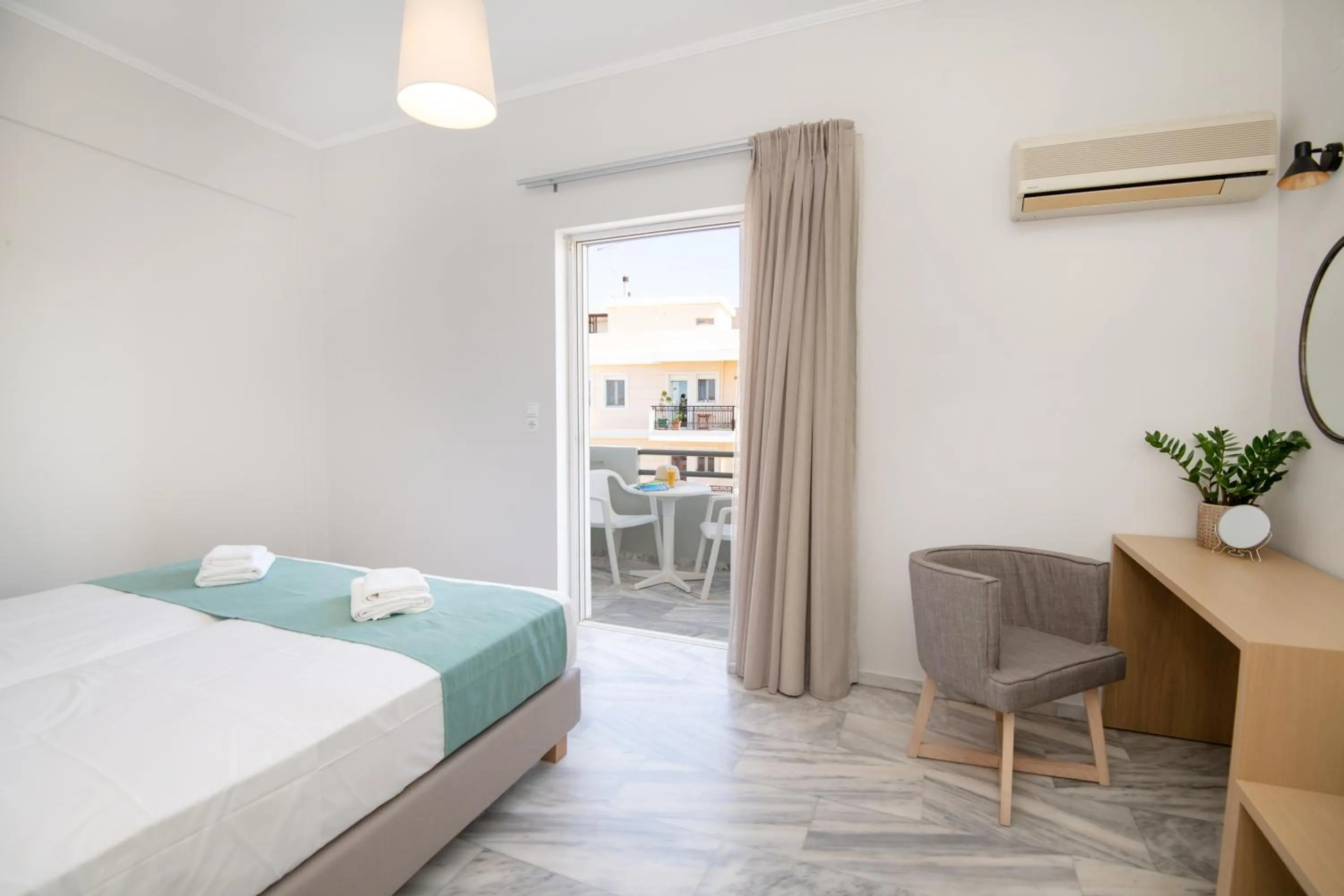 Bed in Mardinik Hotel Apartments