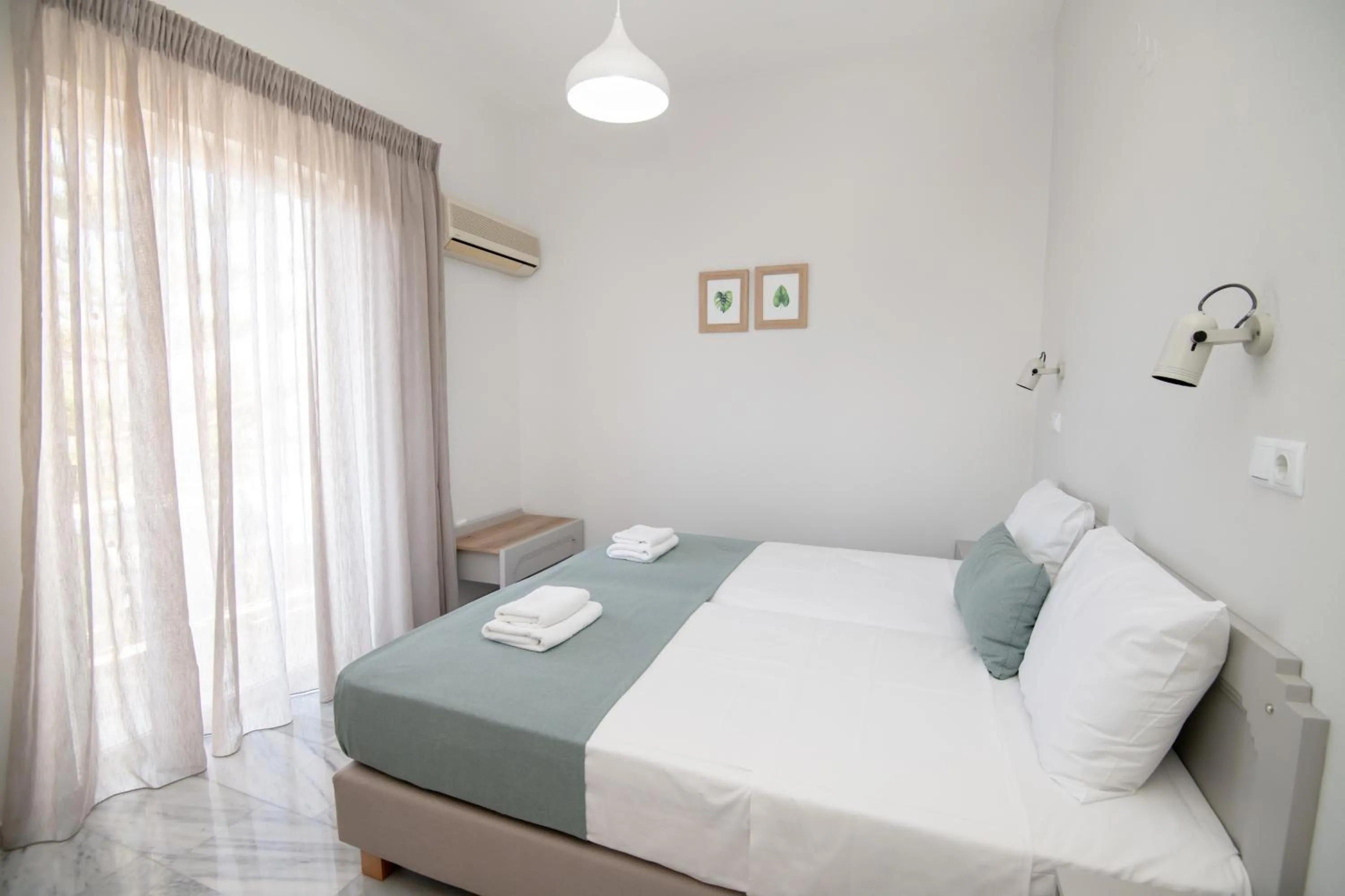 Bed in Mardinik Hotel Apartments