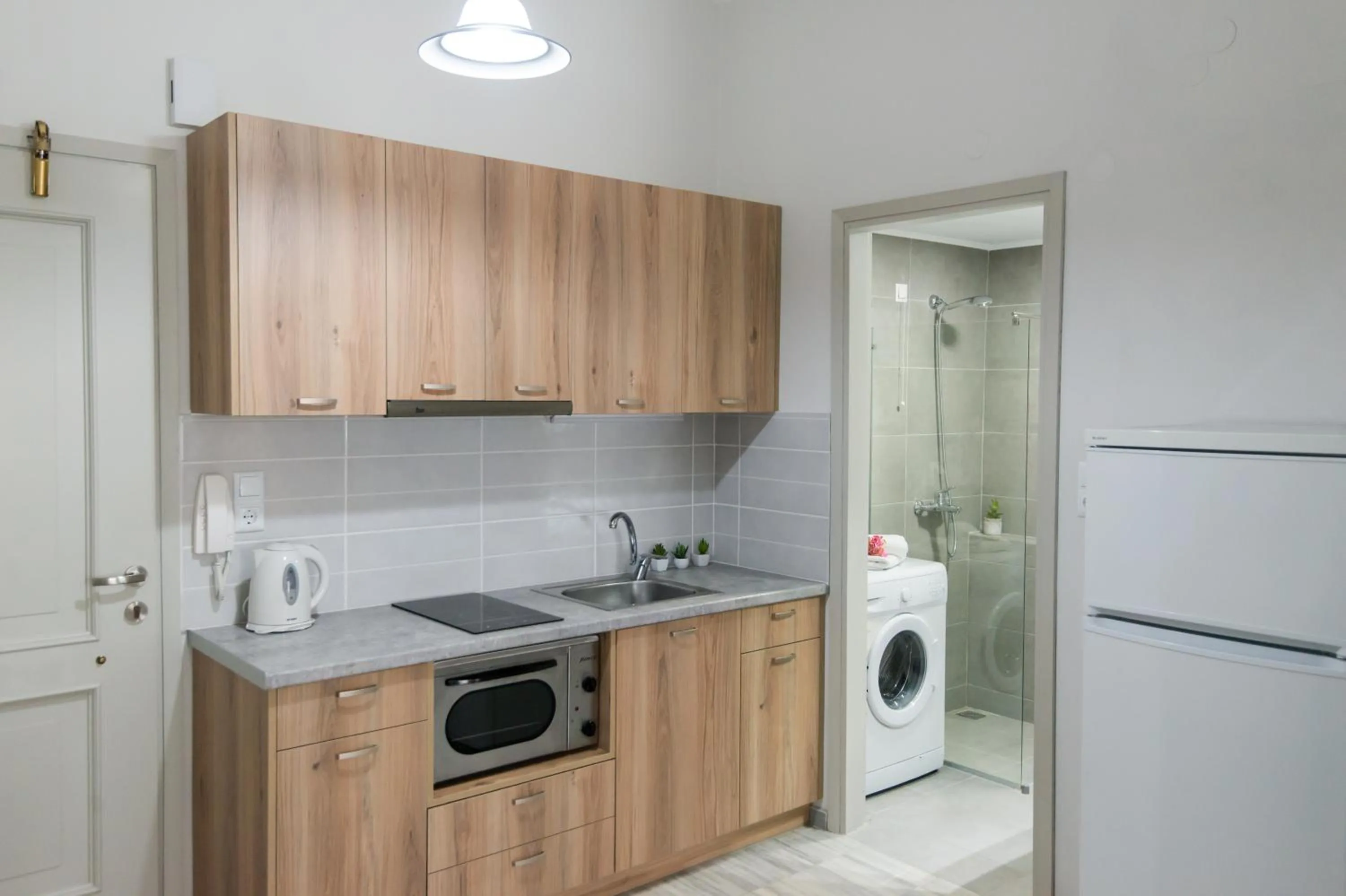 Kitchen or kitchenette in Mardinik Hotel Apartments