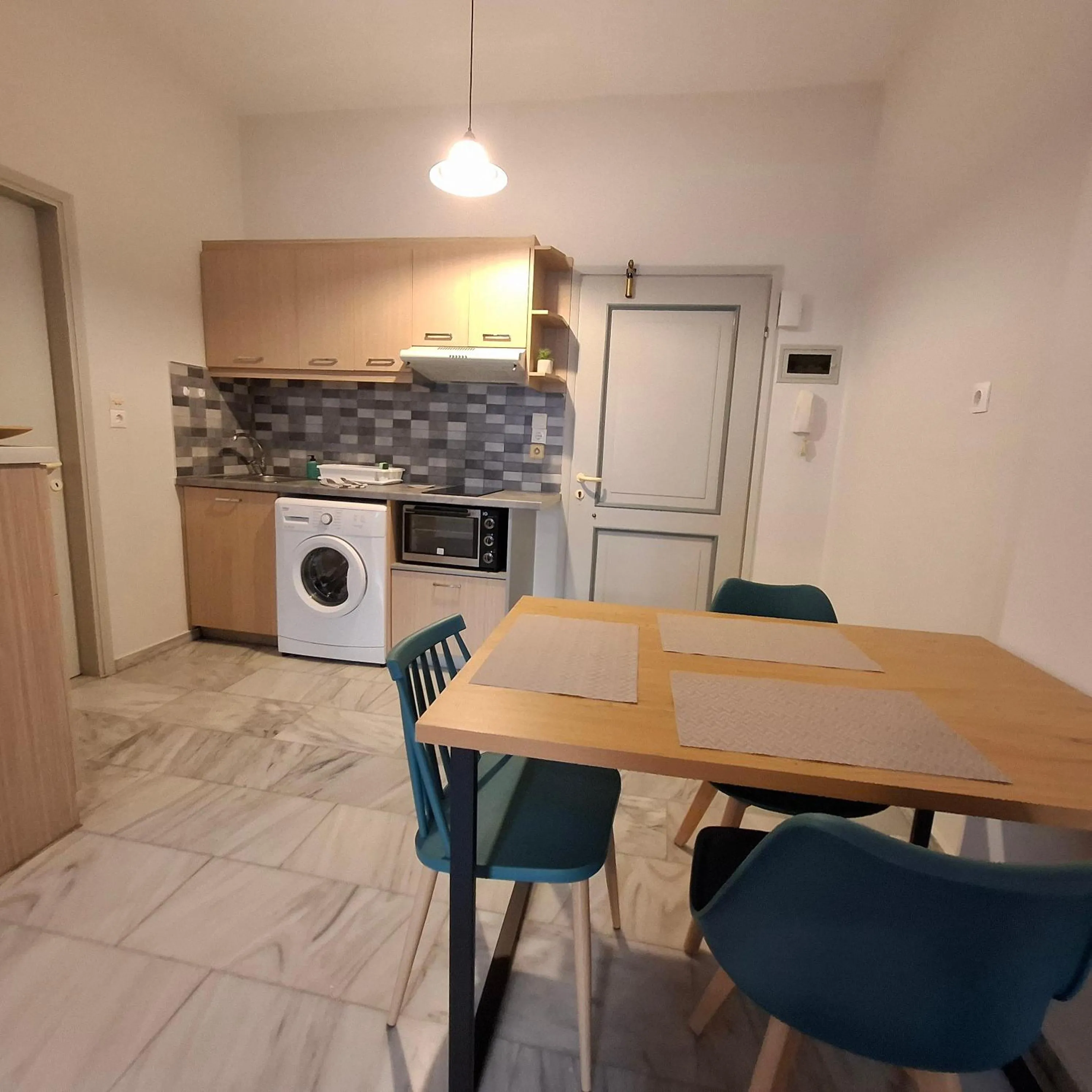 Kitchen or kitchenette in Mardinik Hotel Apartments