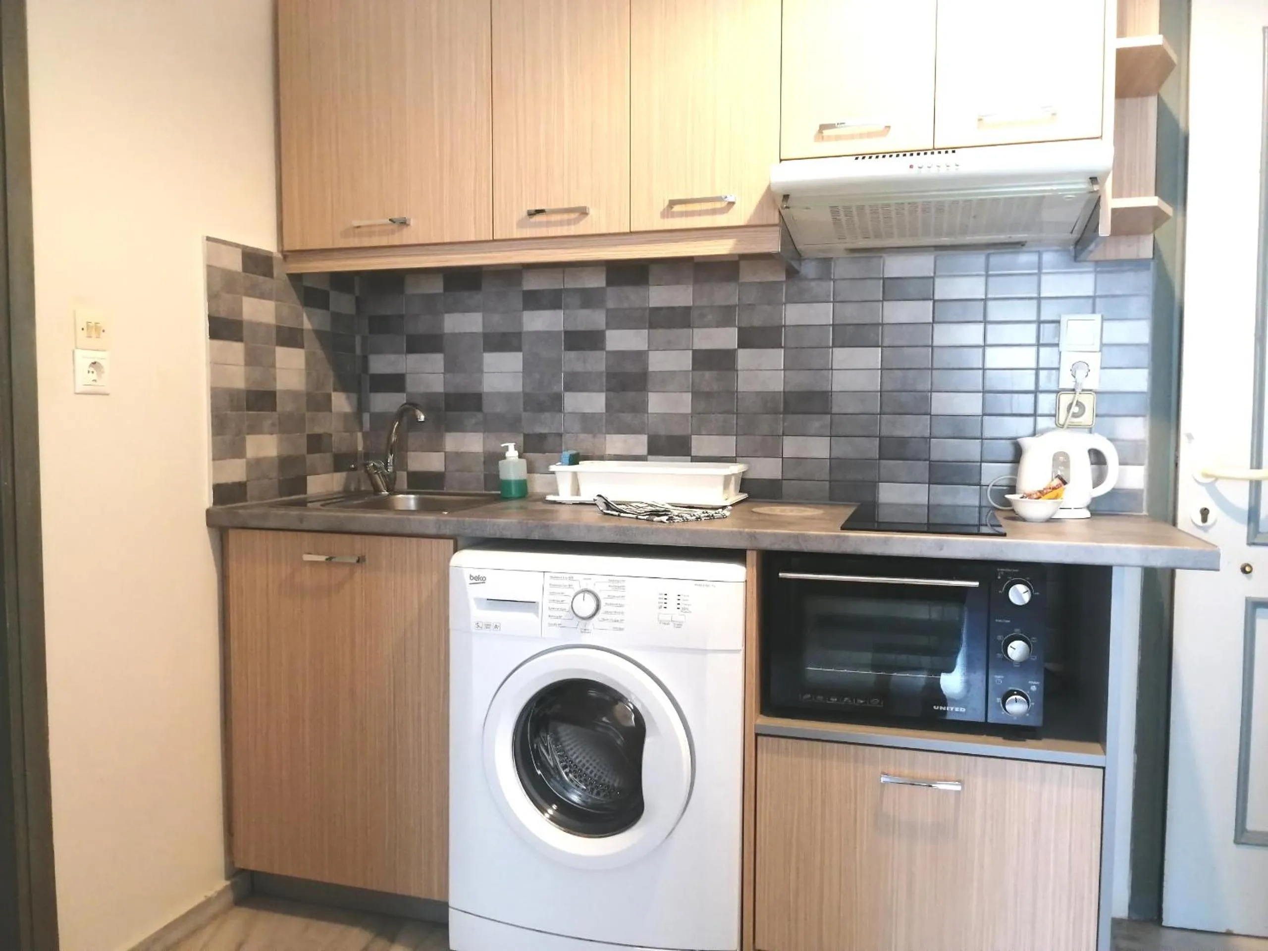 Kitchen or kitchenette in Mardinik Hotel Apartments