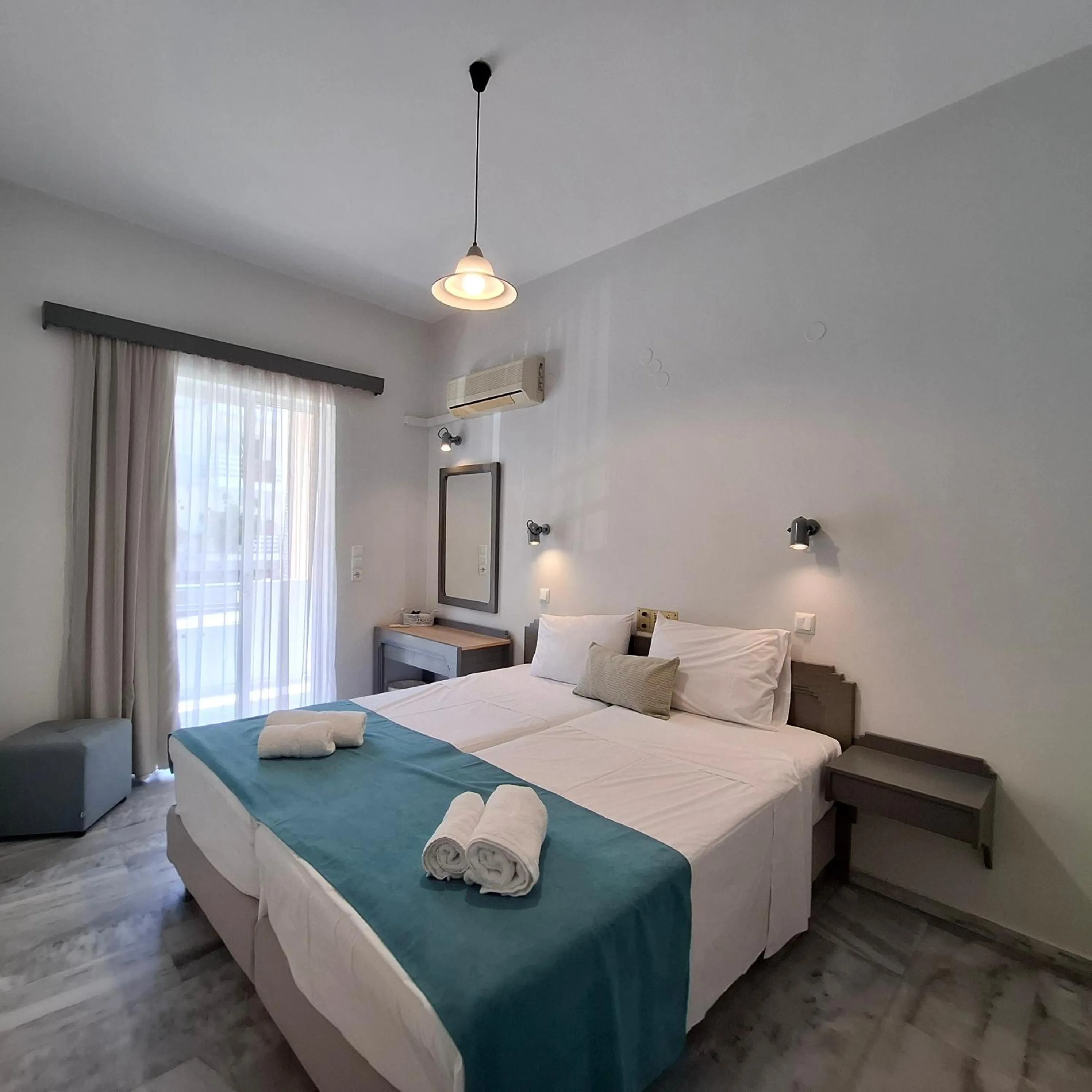 Bed in Mardinik Hotel Apartments