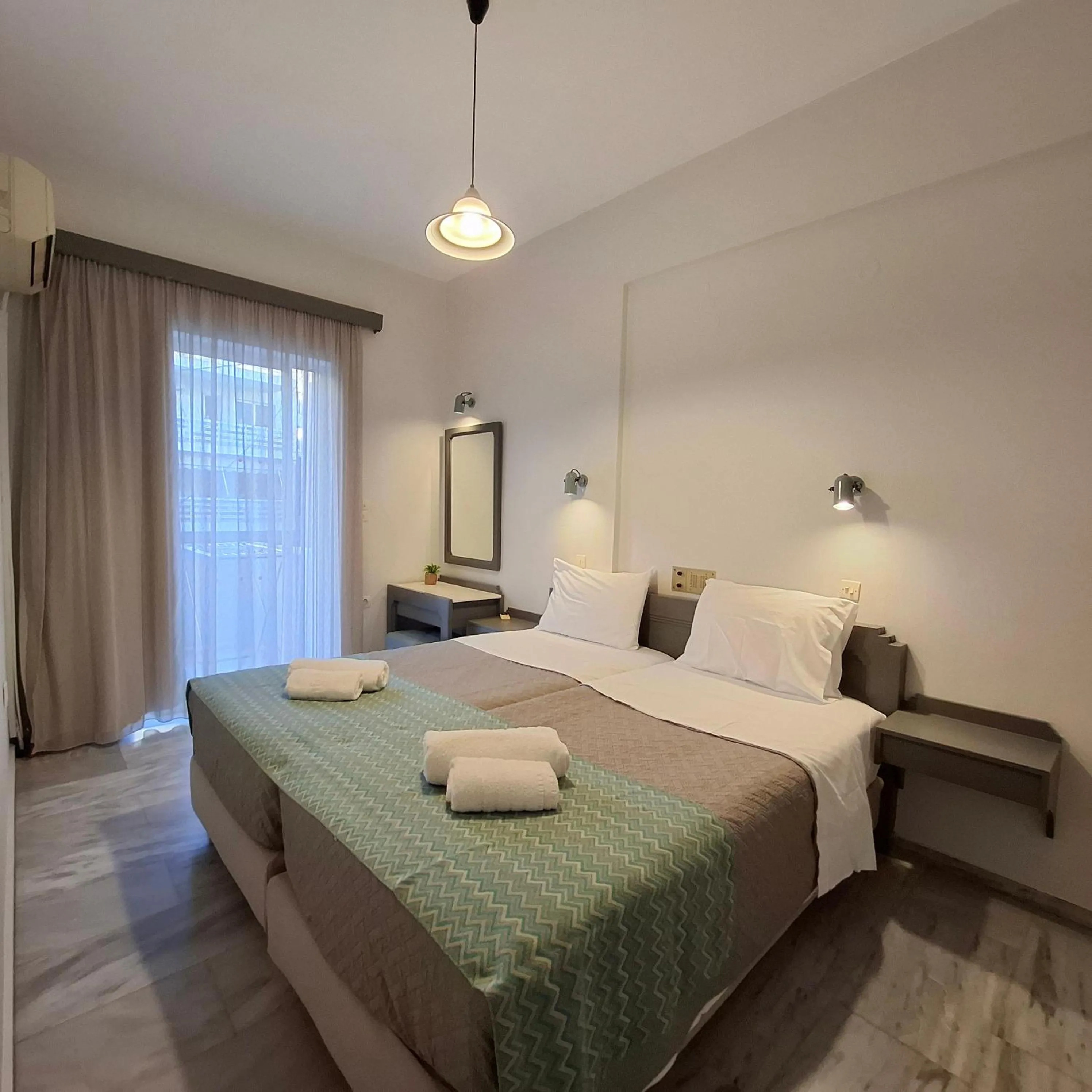 Bed in Mardinik Hotel Apartments