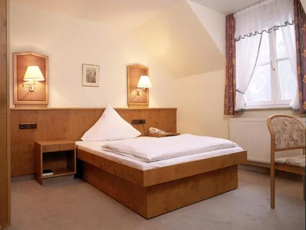 Photo of the whole room, Bed in Hotel "Untere Mühle"