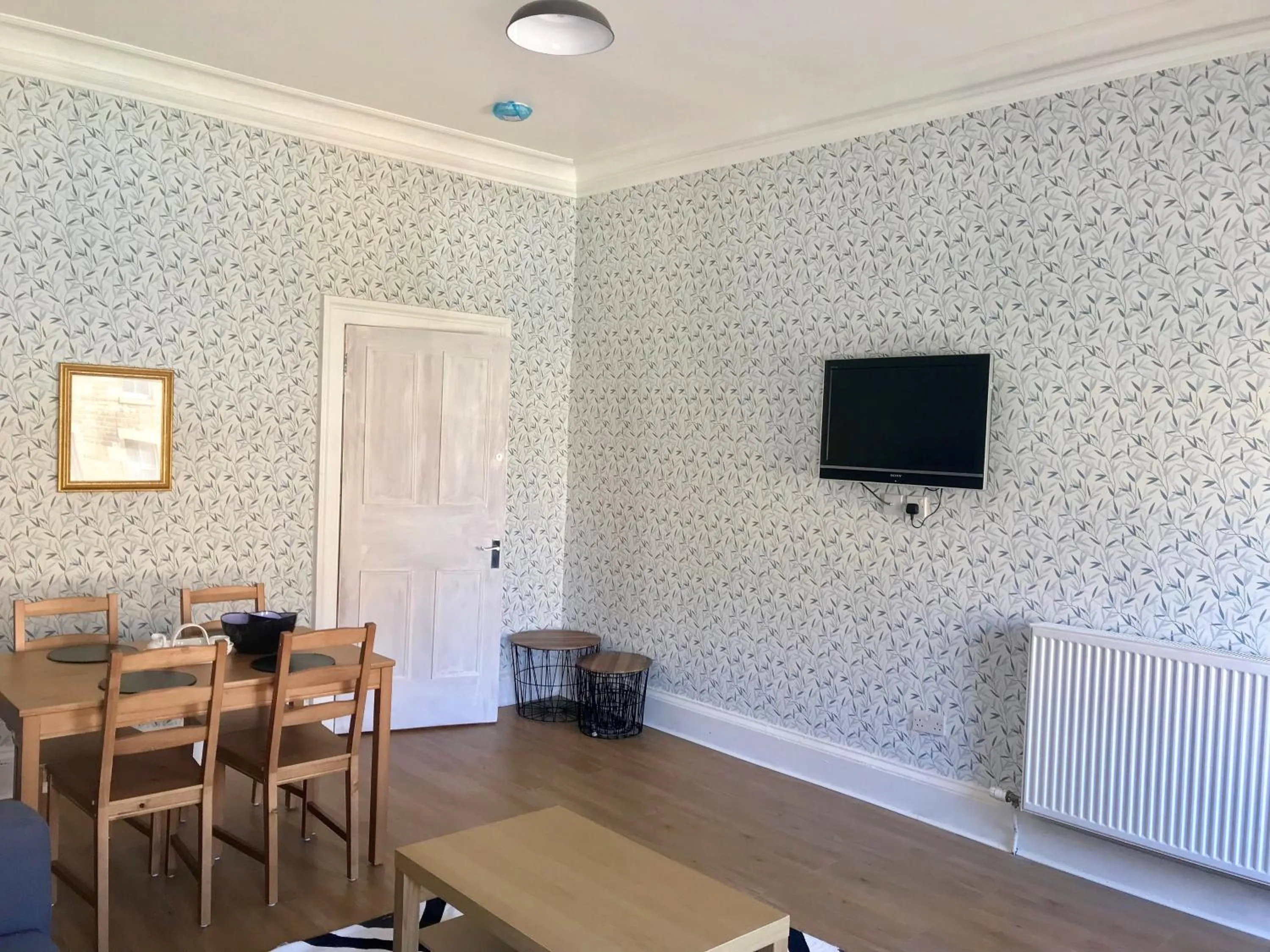 Seating area in 233 Leith Apartment
