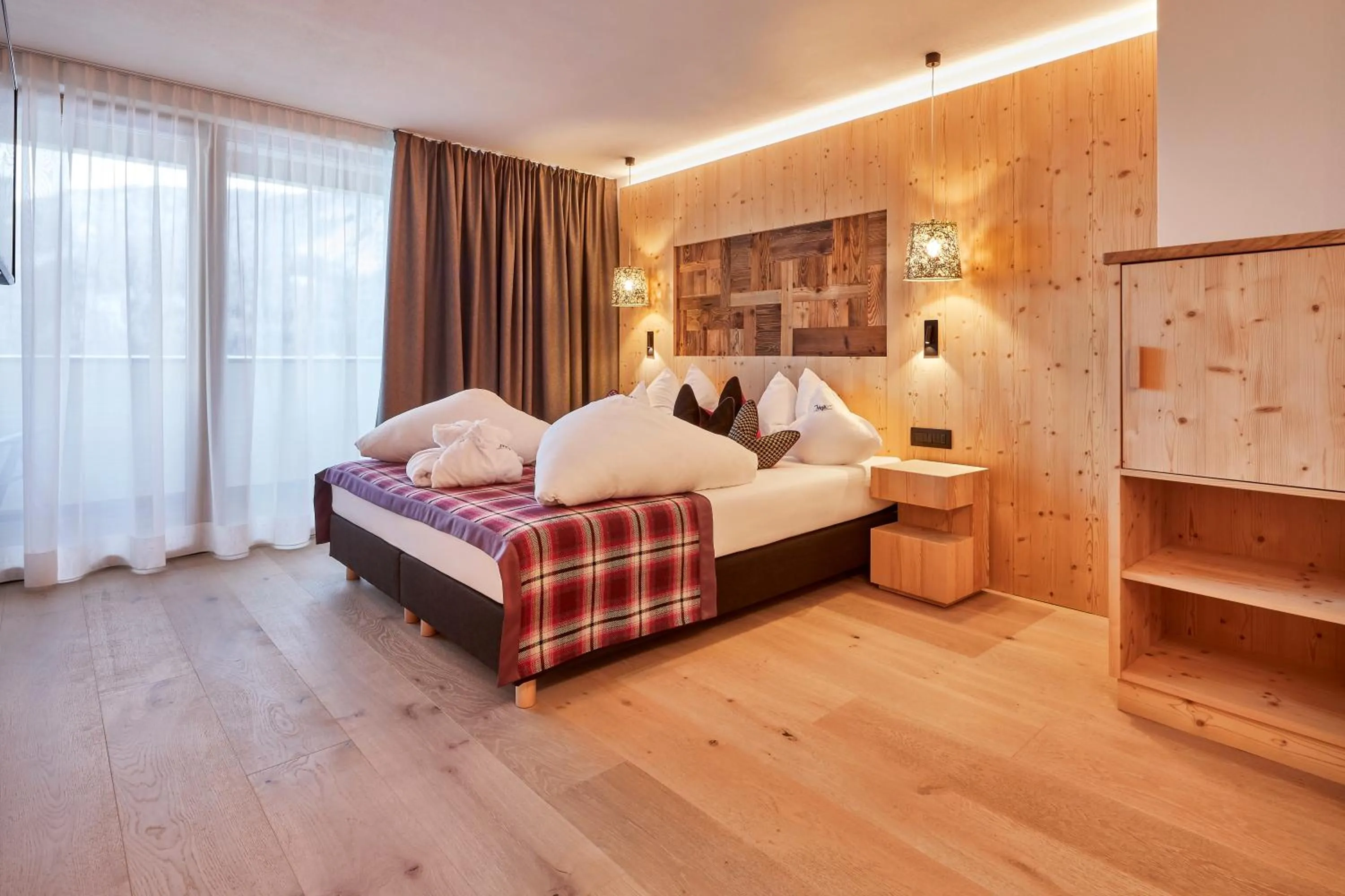 Bed in Mountain Hotel Mezdì