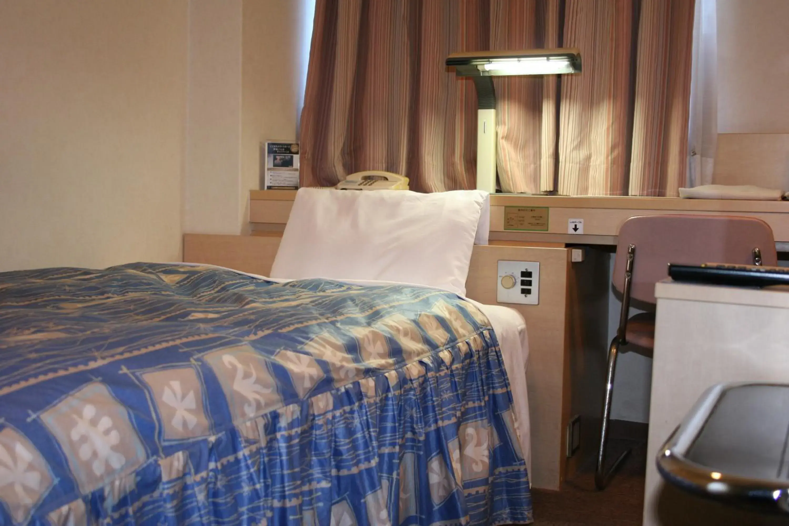 Bed in The Celecton Takamatsu Bed in The Celecton Takamatsu