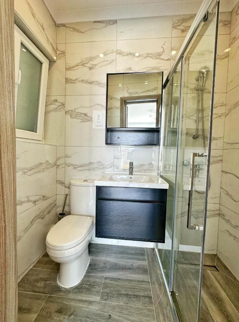 Shower in For Rest Aparthotel