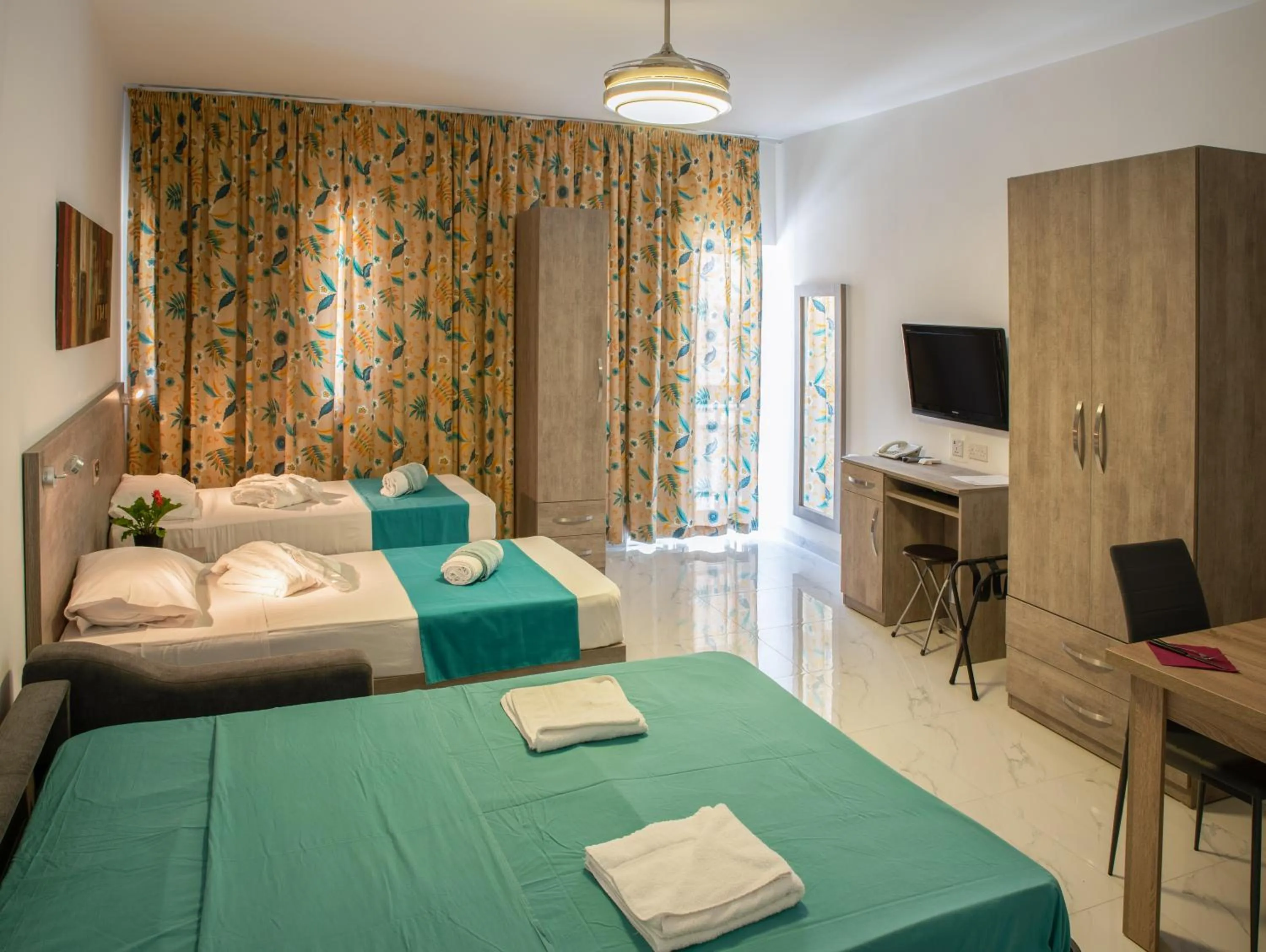 Bed in For Rest Aparthotel