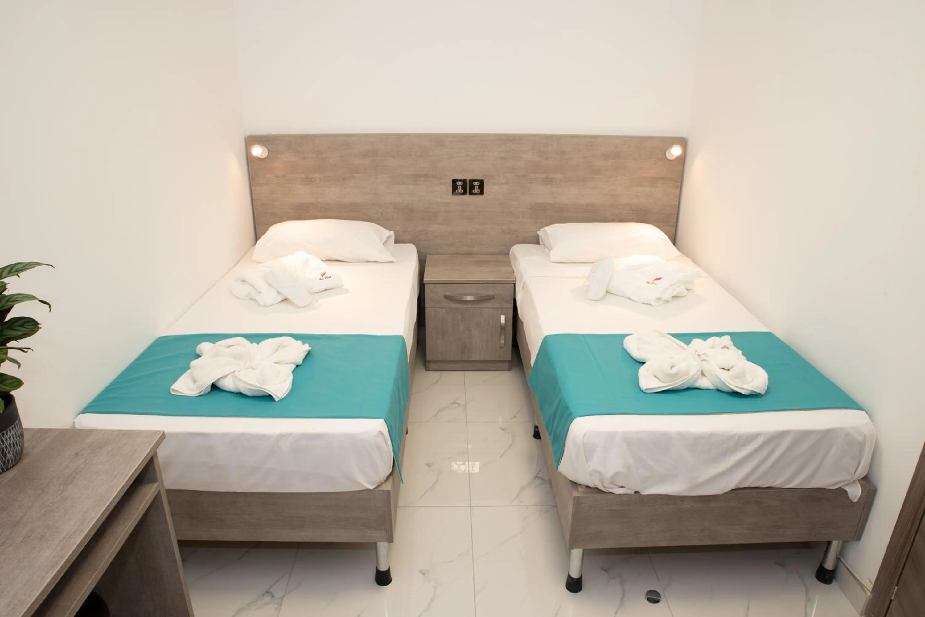 Bed in For Rest Aparthotel