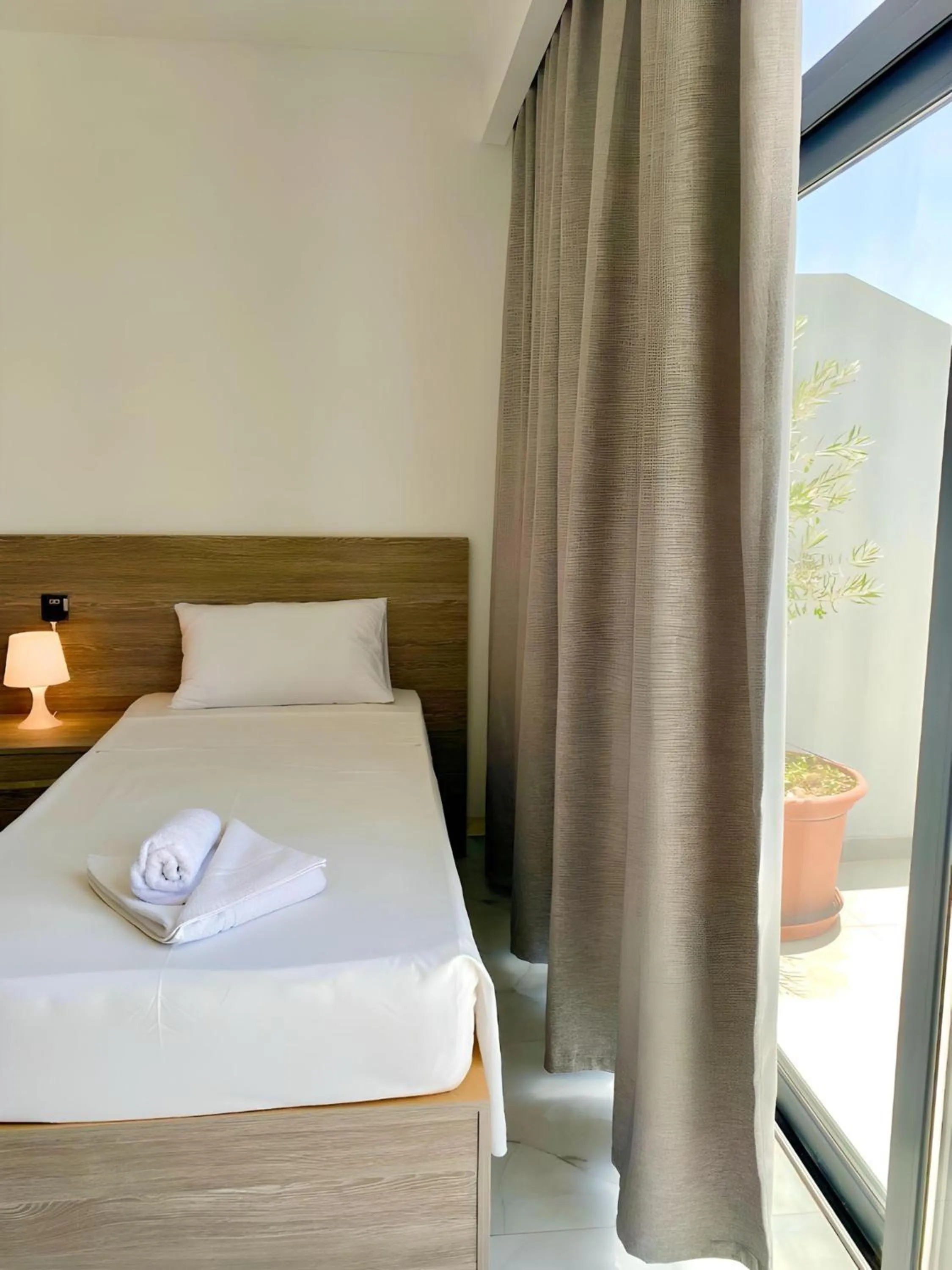 Bed in For Rest Aparthotel