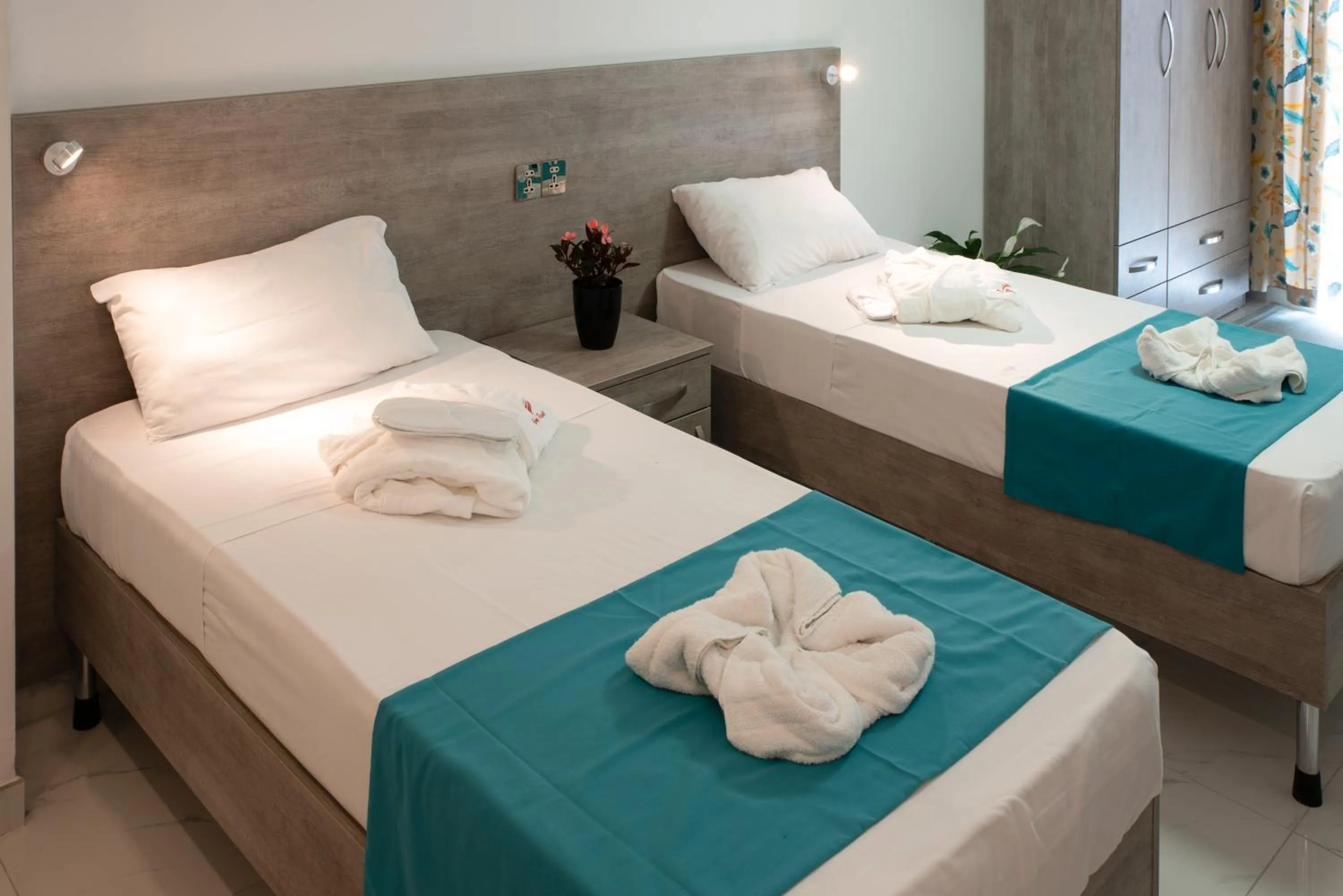 Bed in For Rest Aparthotel