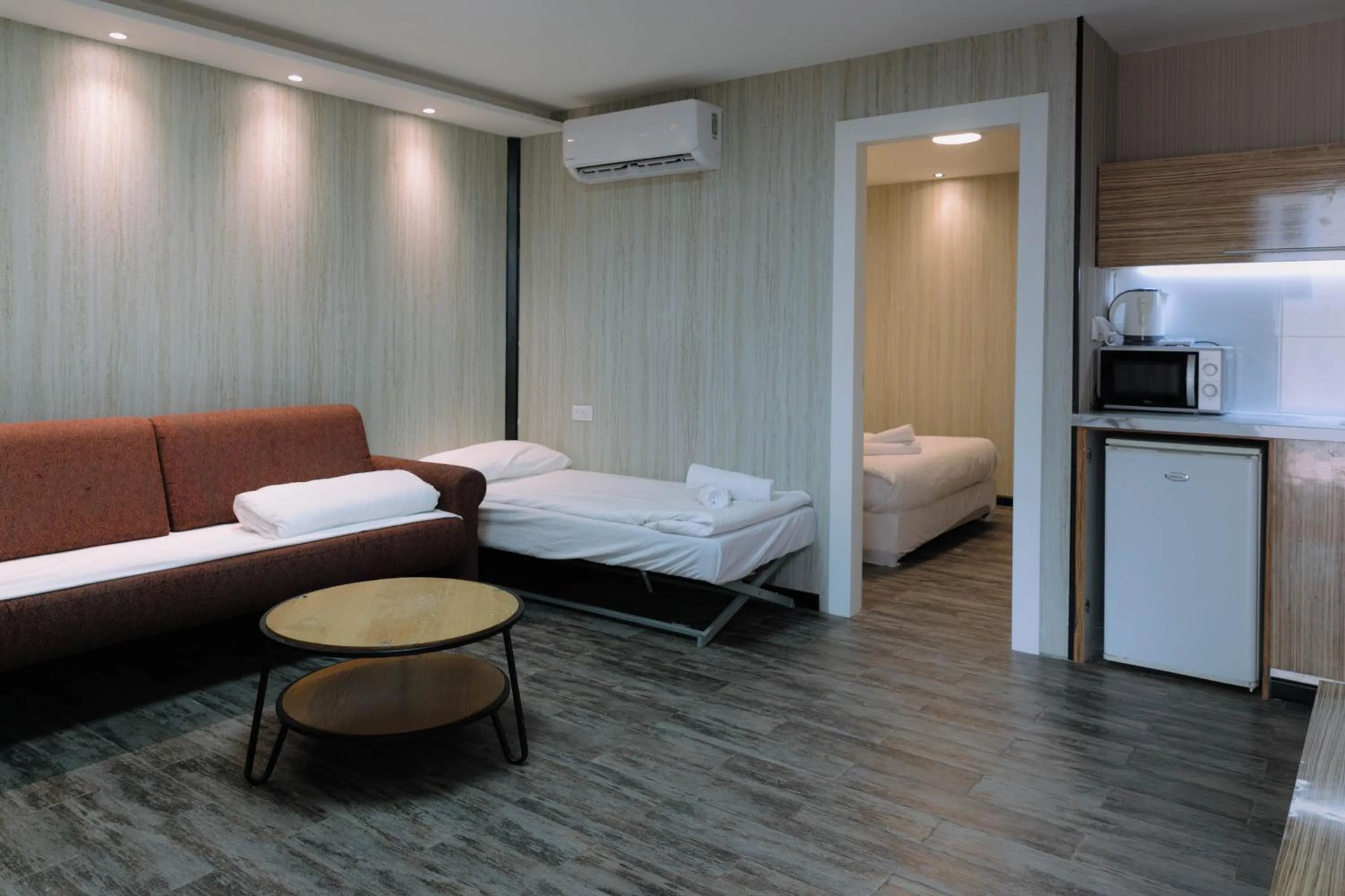 Living room, Bed in Rich apartments renovated & with modern design