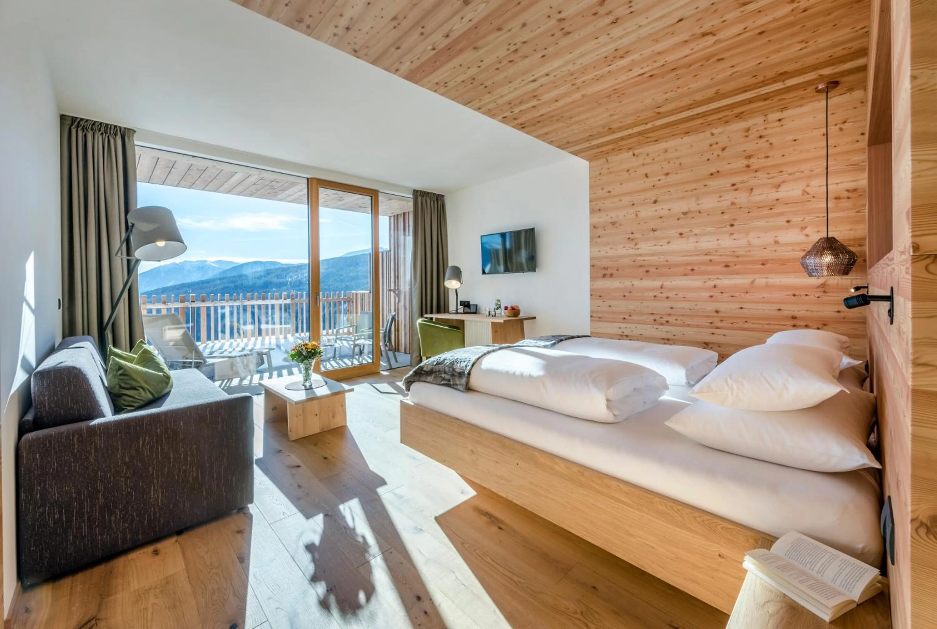 Balcony/Terrace, Bed in Tratterhof Mountain Sky Hotel