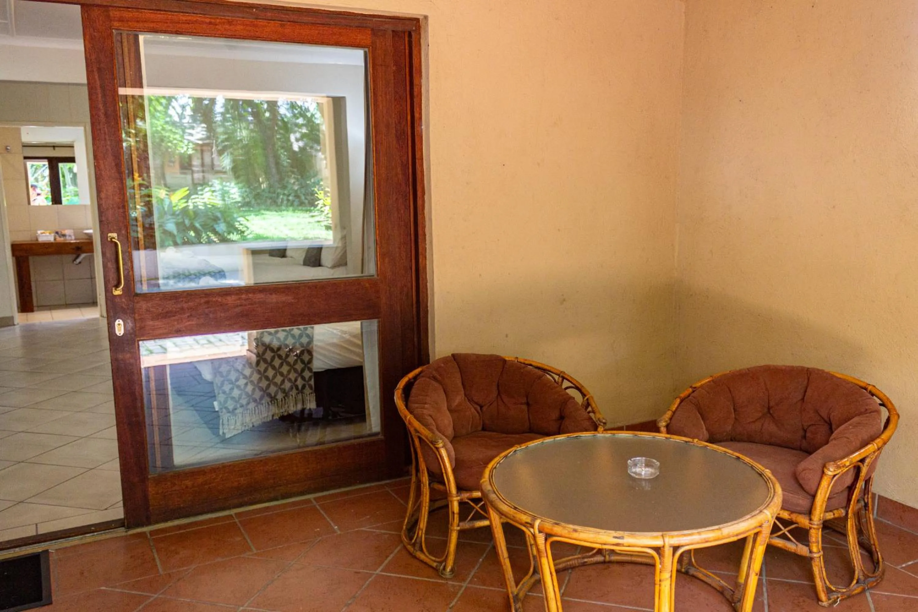 Seating area in Hotel Numbi & Garden Suites