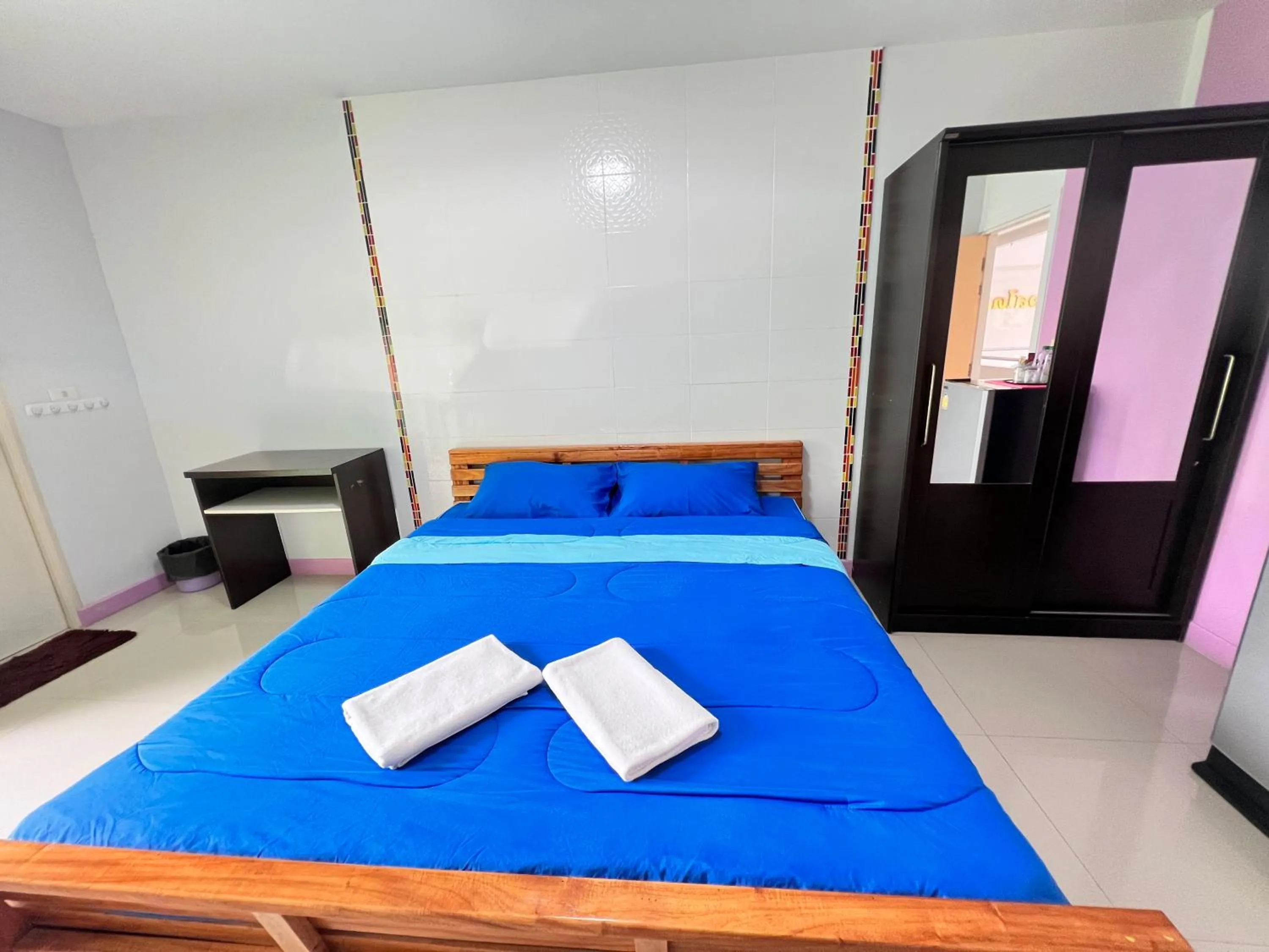 Bed in S Diamond Apartment