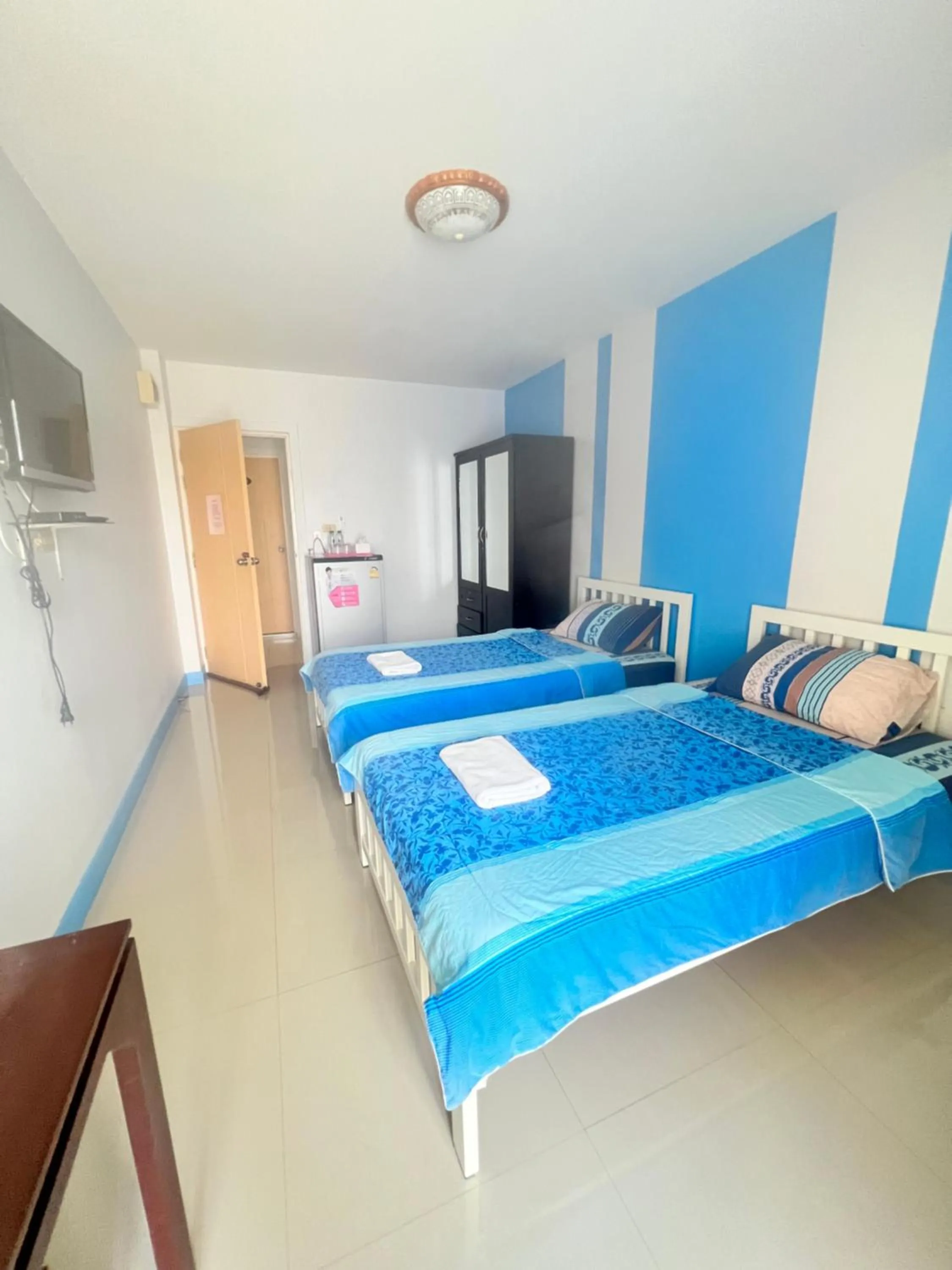 Bed in S Diamond Apartment