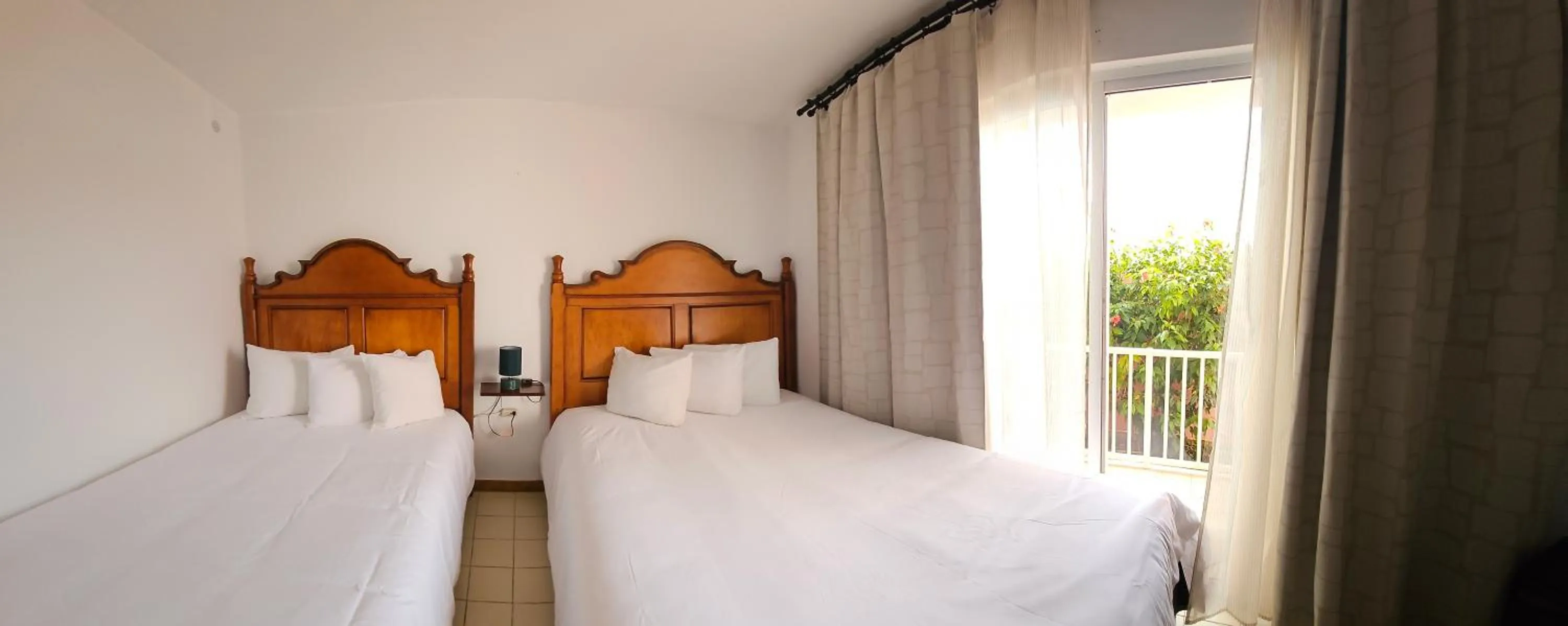 Bed in Selva Boutique Hotel - Luquillo Oceanfront Retreat - Adults Only