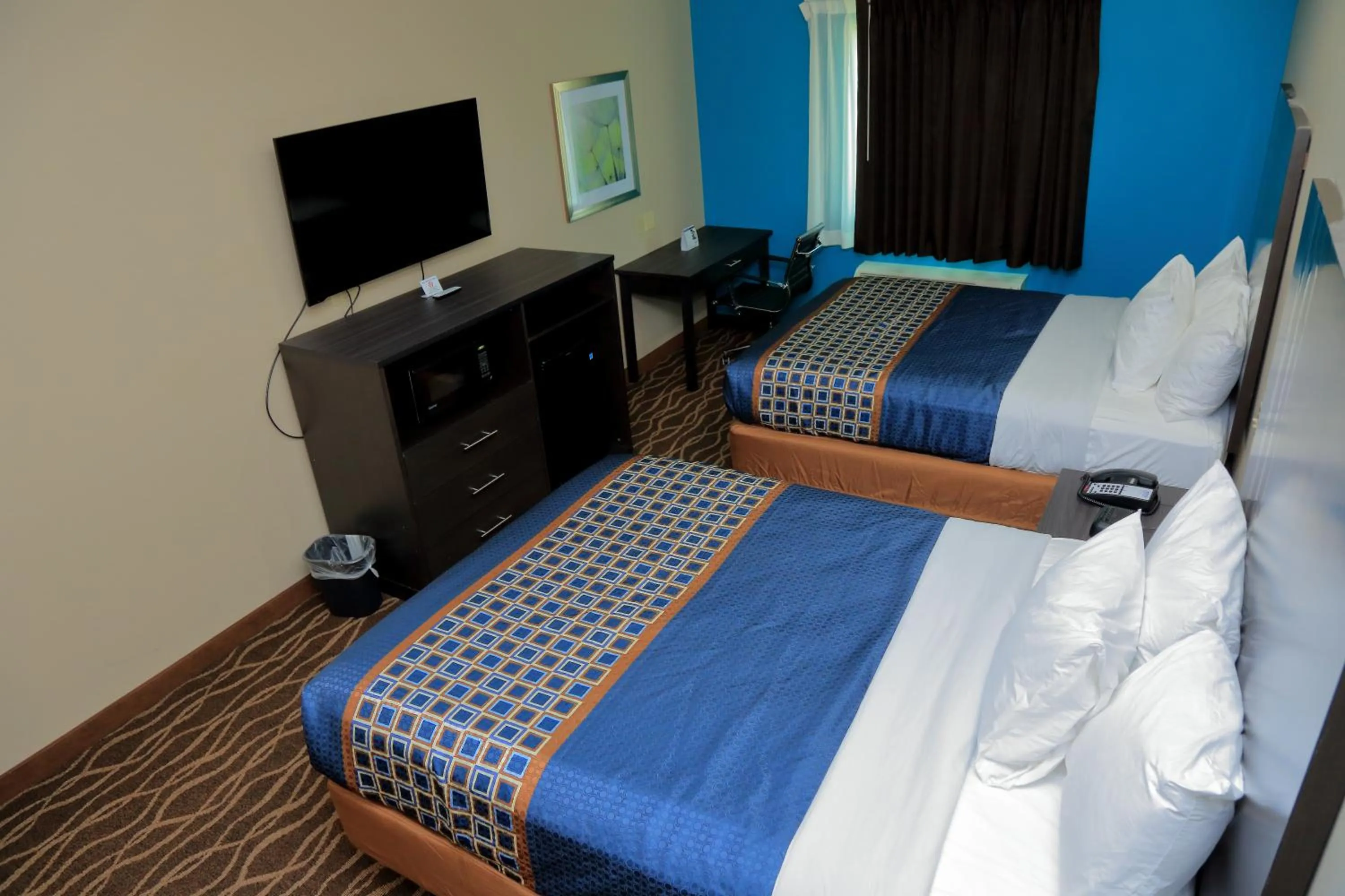 Bed in Americas Best Value Inn & Suites-Prairieville