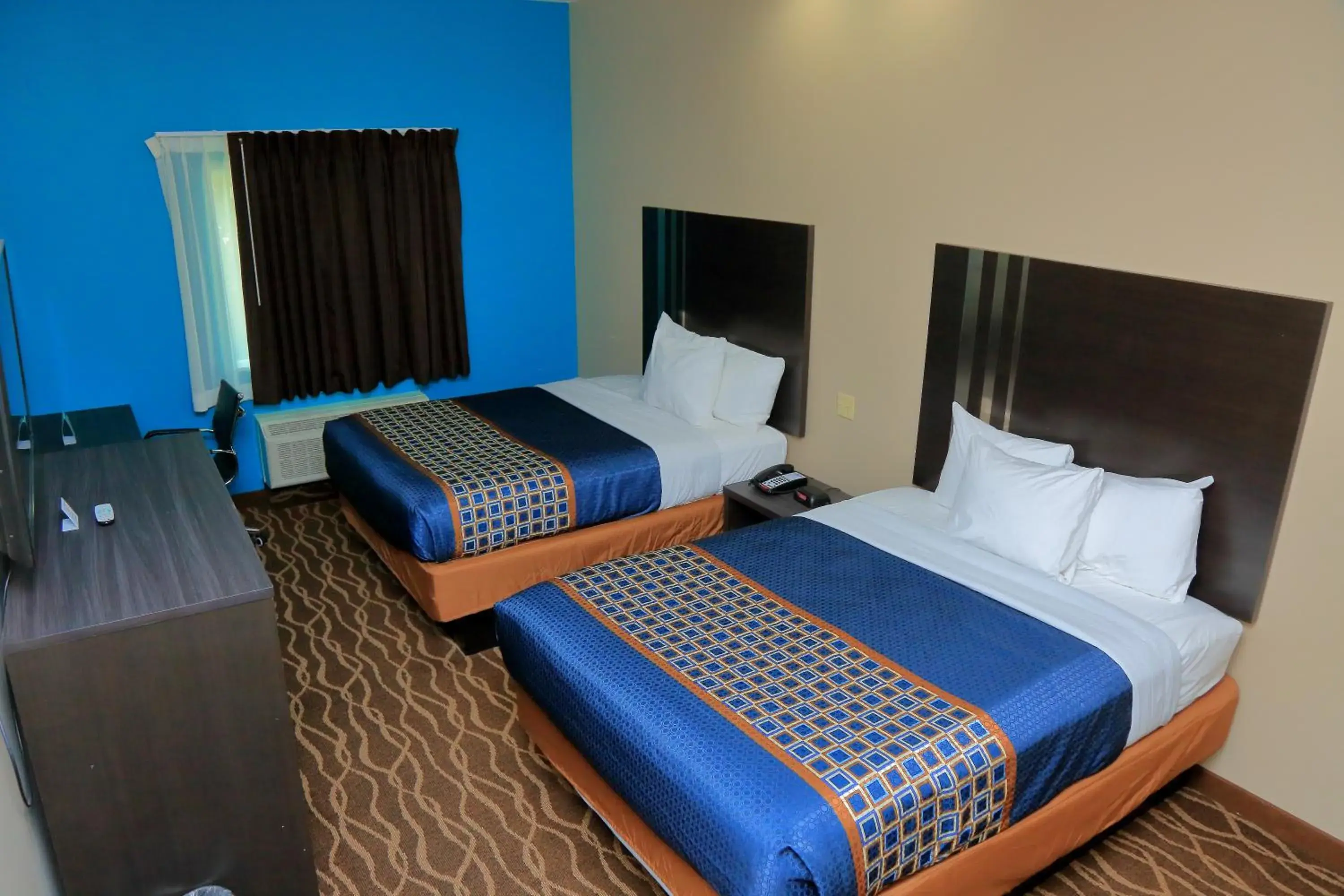 Bed in Americas Best Value Inn & Suites-Prairieville Bed in Americas Best Value Inn & Suites-Prairieville