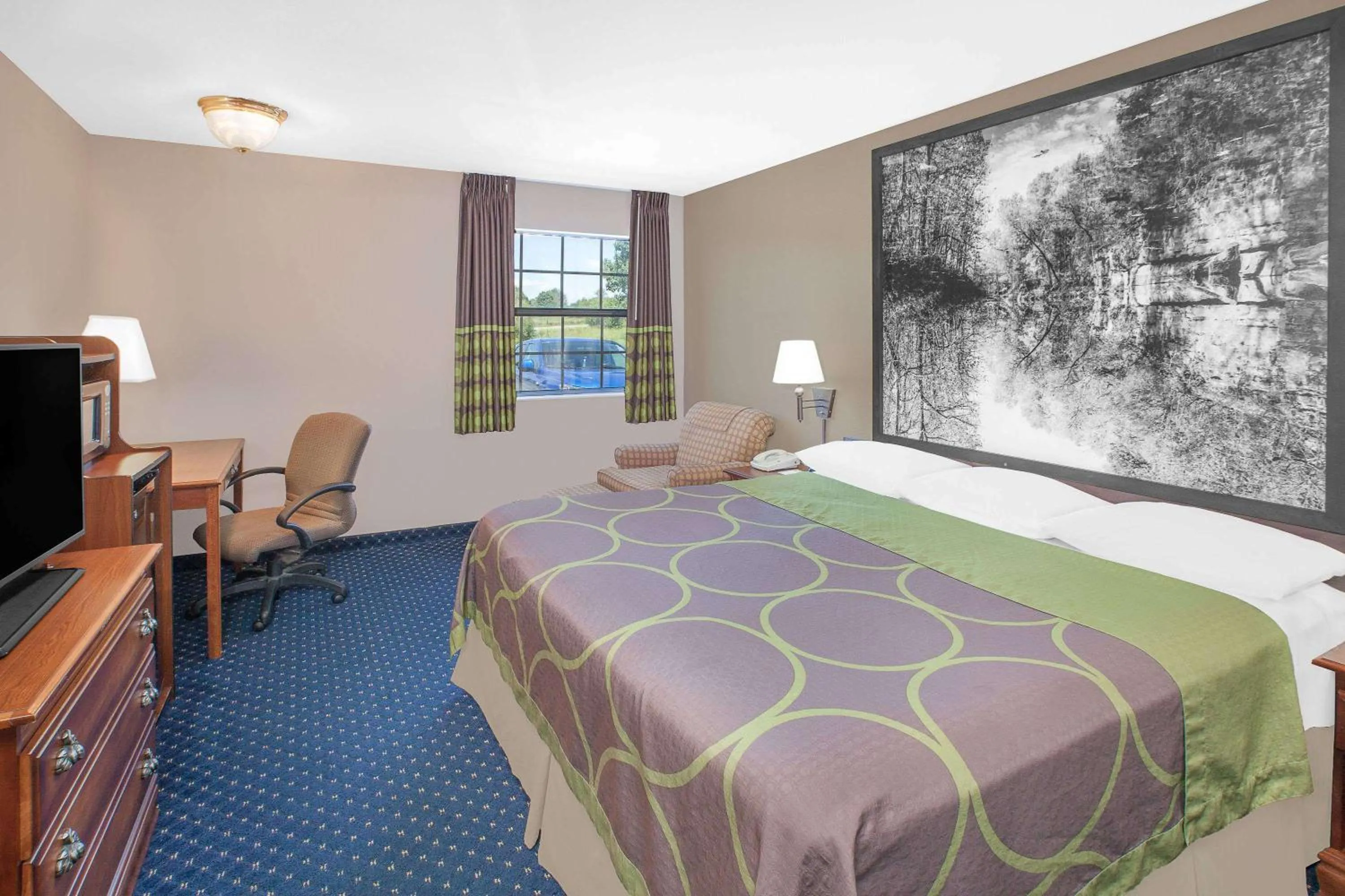 Photo of the whole room, Bed in Super 8 by Wyndham Lowell/Bentonville/Rogers Area