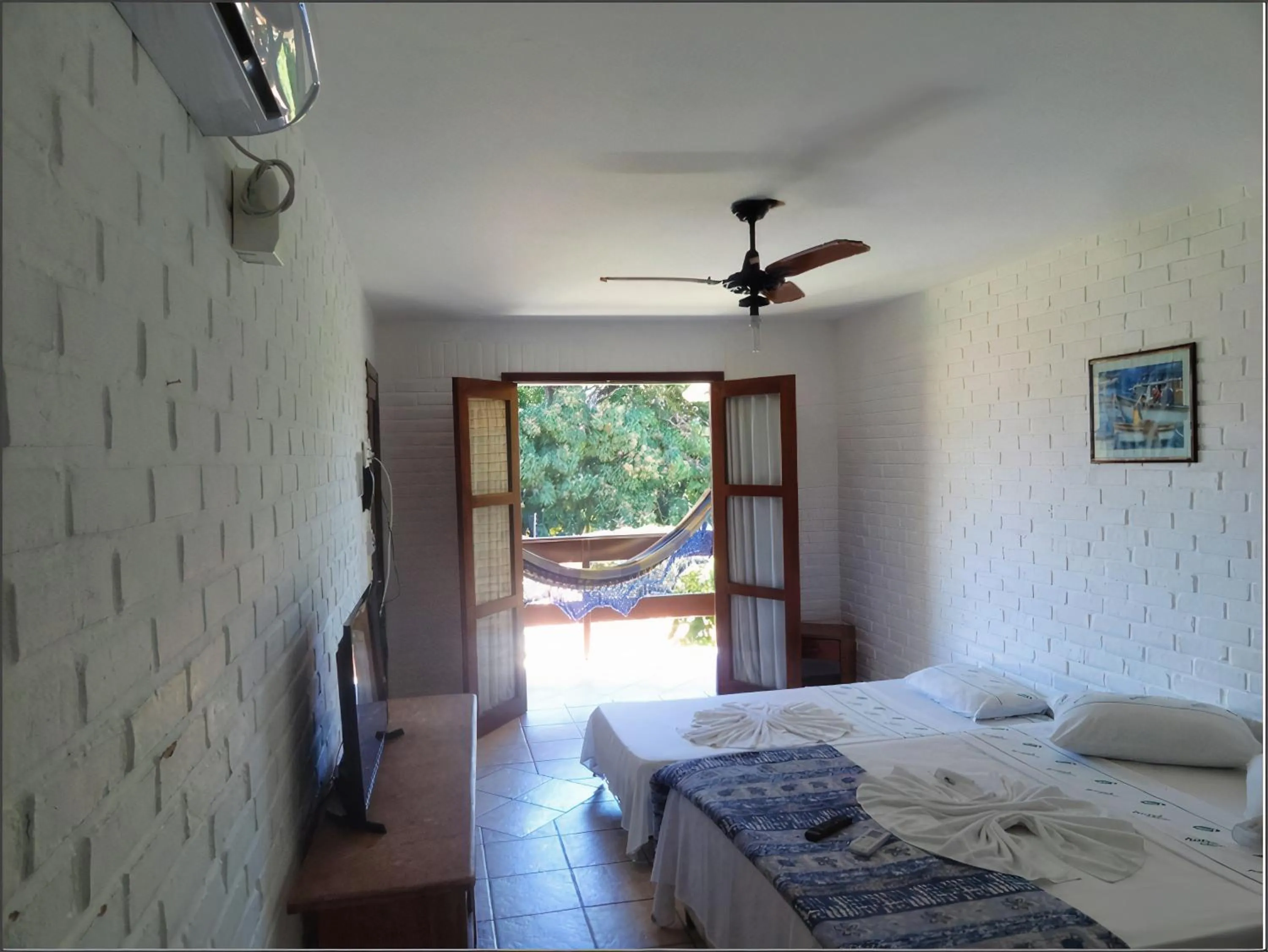 Bed in Hotel Tubarão