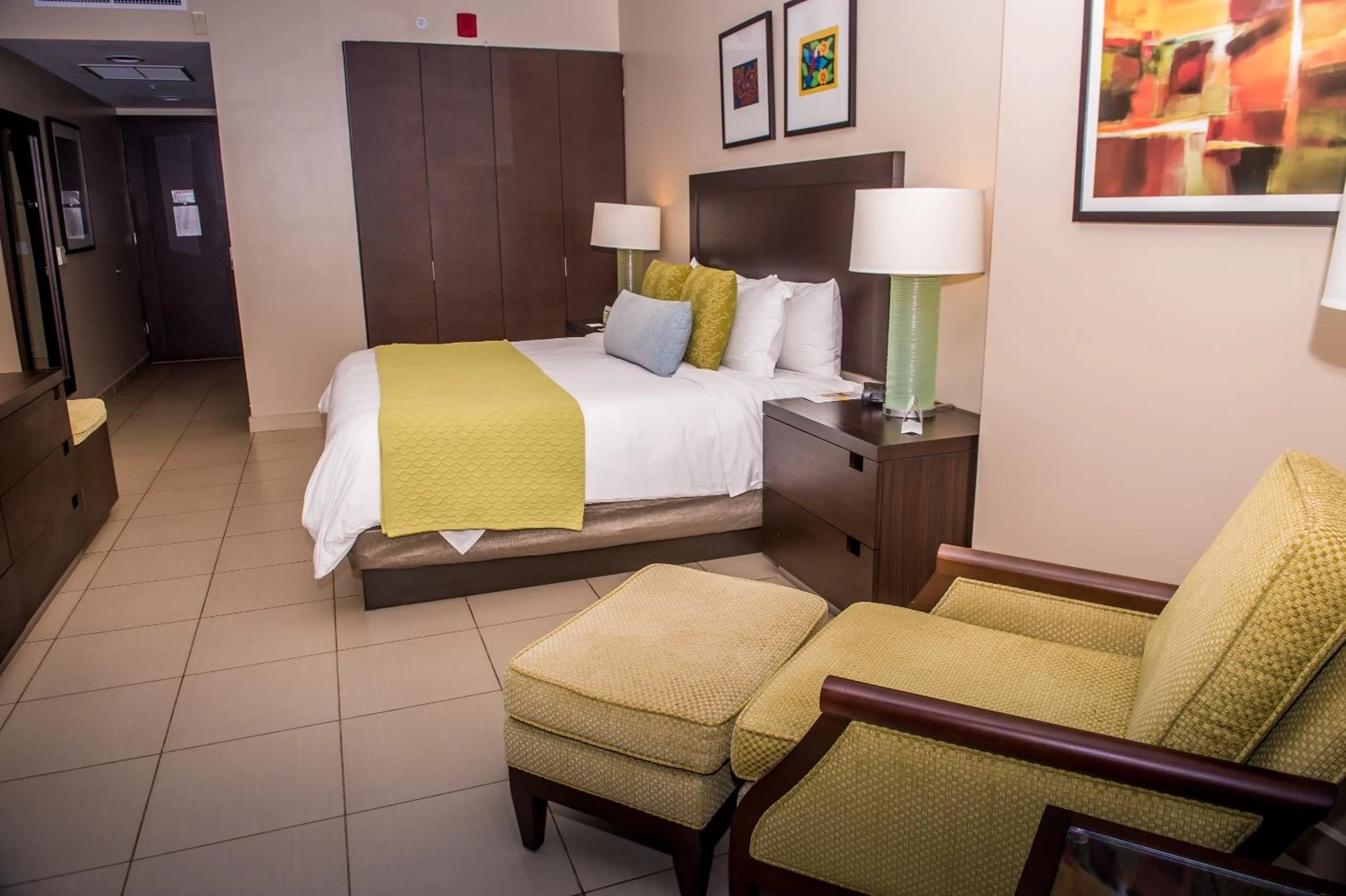 Bedroom, Bed in Summit Rainforest Golf Resort & All Inclusive