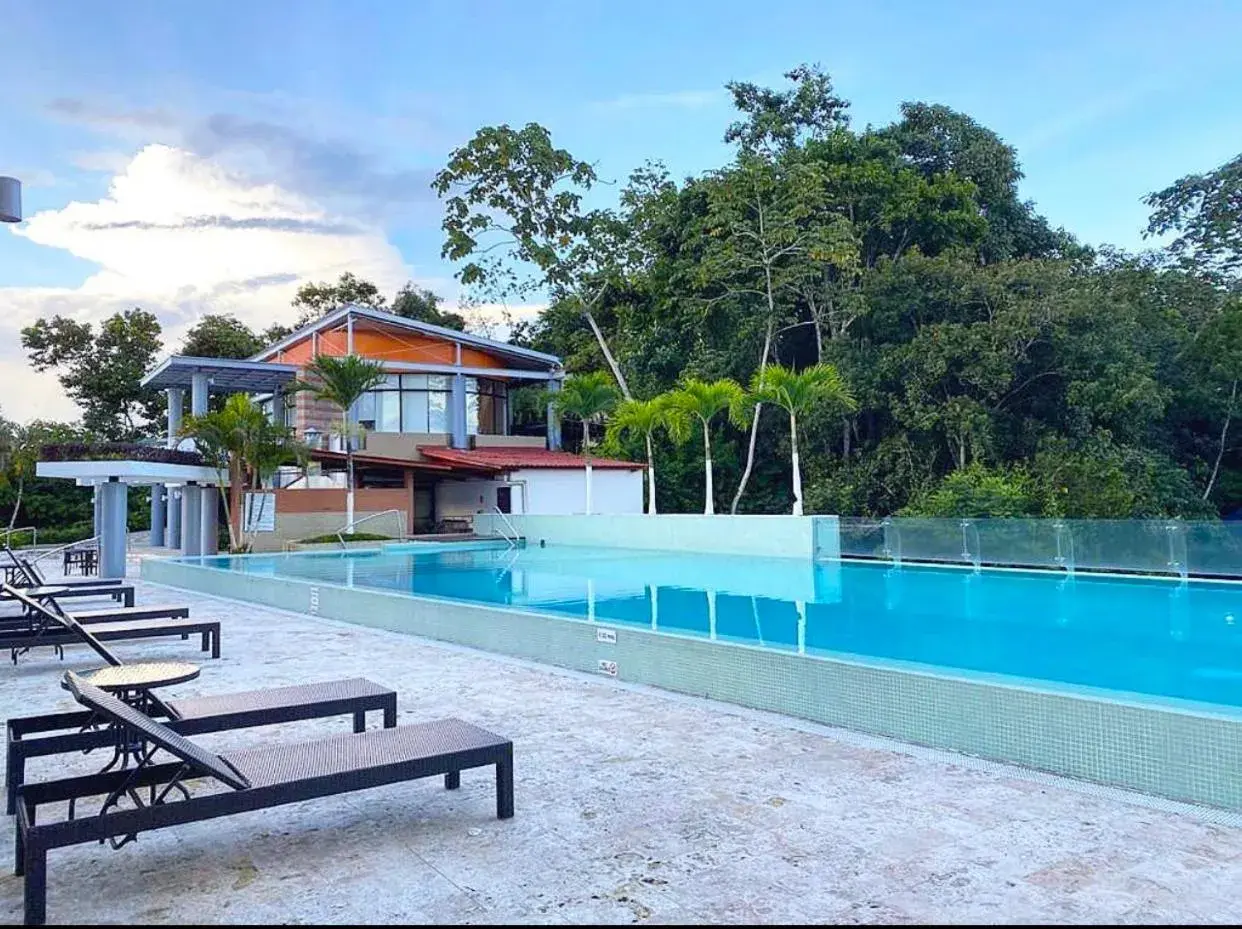 Swimming pool in Summit Rainforest Golf Resort & All Inclusive Swimming pool in Summit Rainforest Golf Resort & All Inclusive