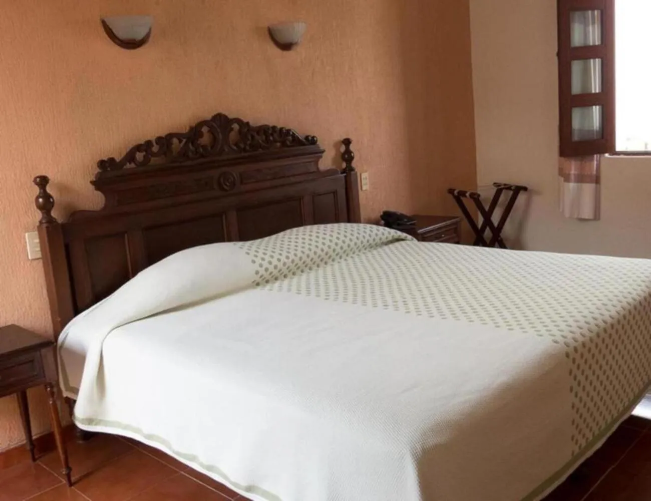 Bed in Hotel Posada Doña Lala