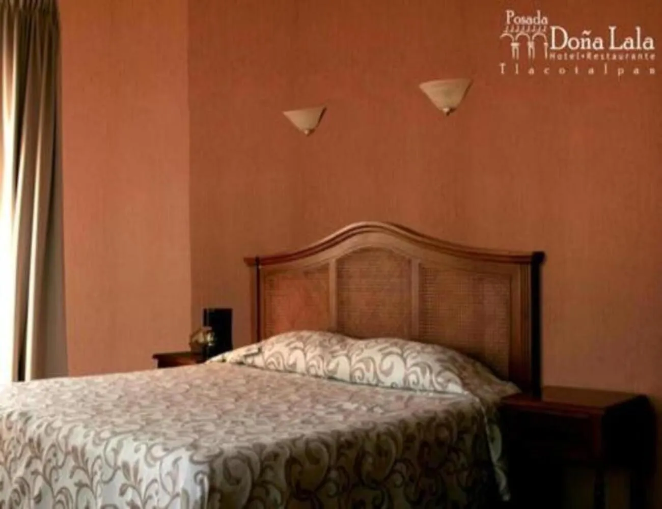 Bed in Hotel Posada Doña Lala