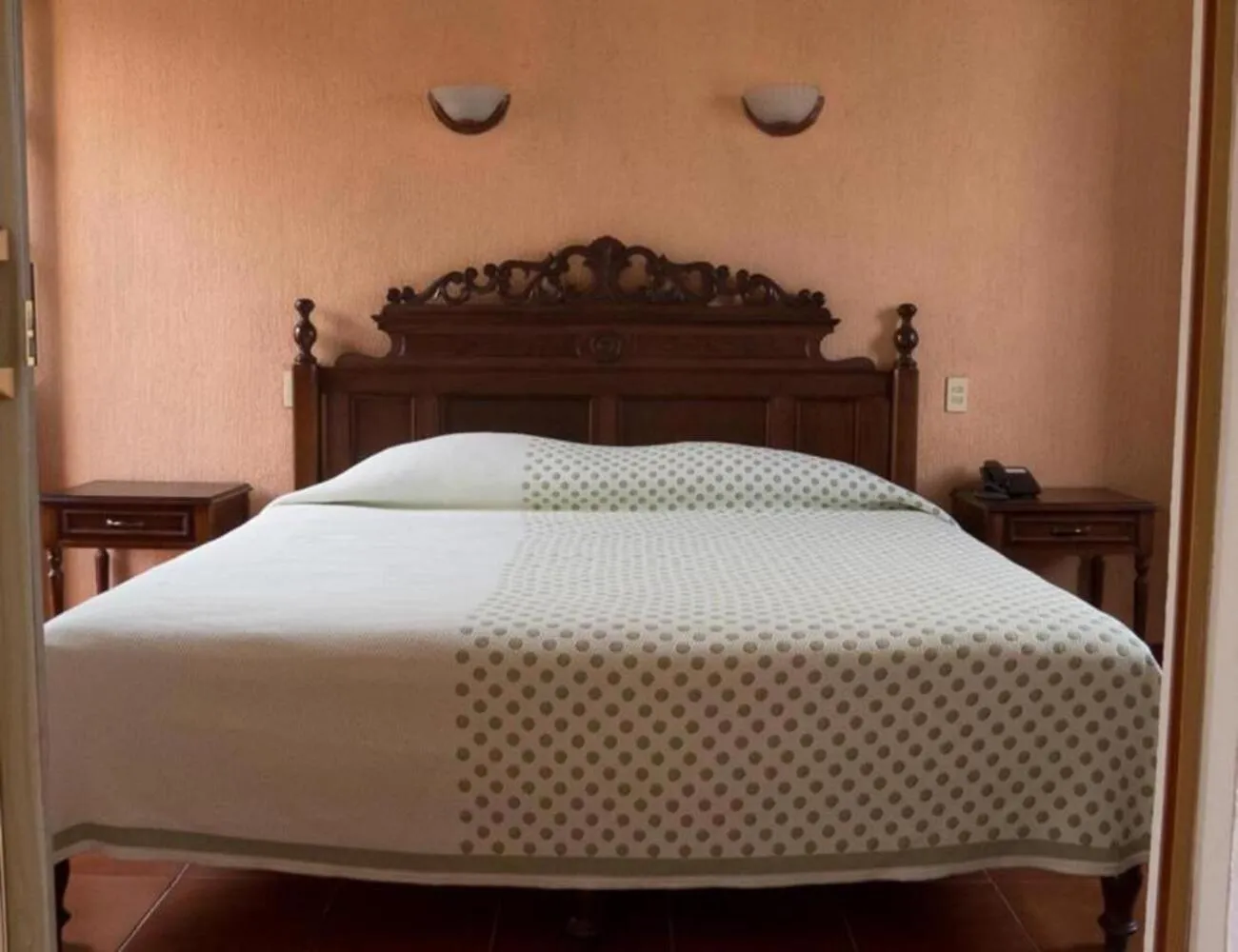 Bed in Hotel Posada Doña Lala