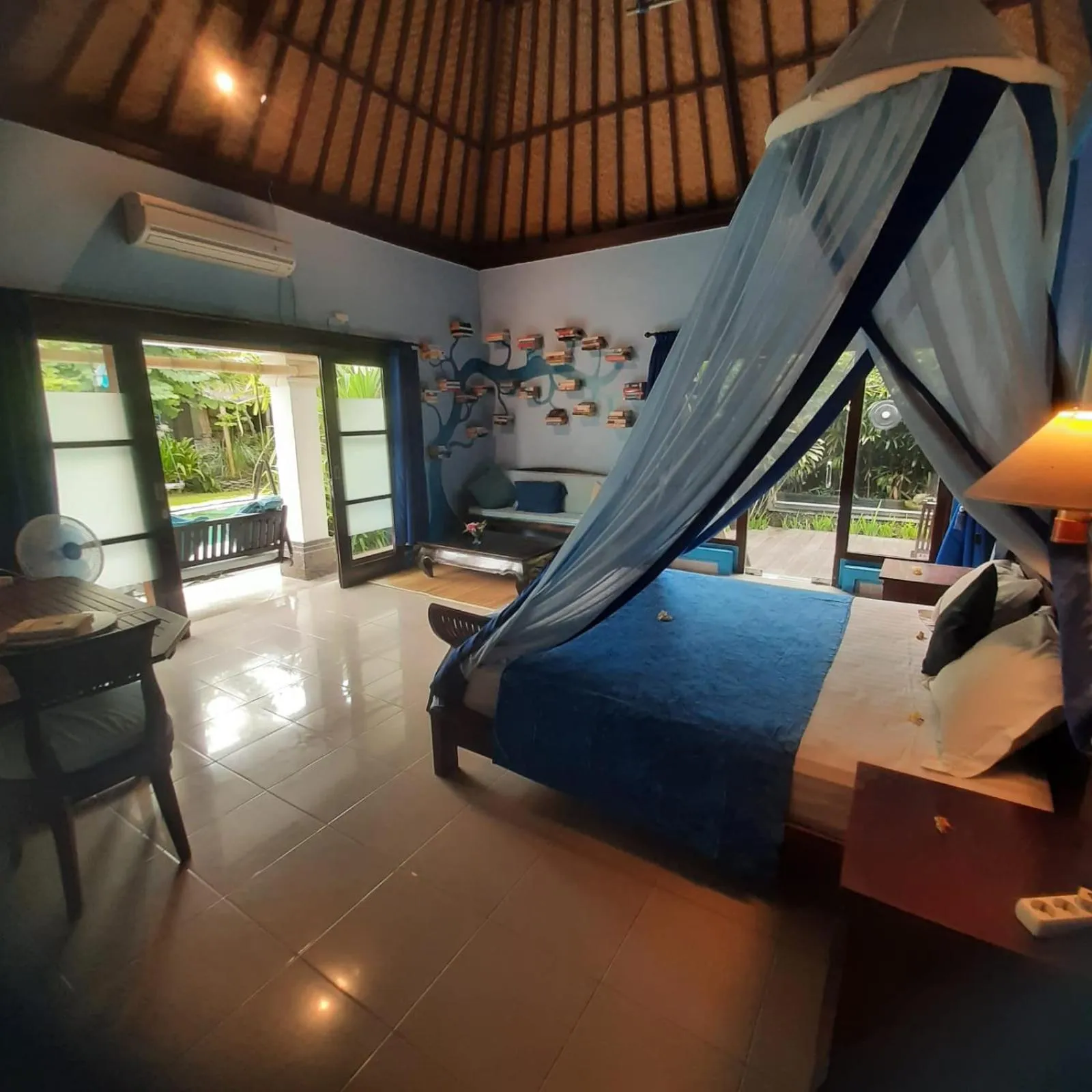 Bed in Villa Shantitara Bungalows