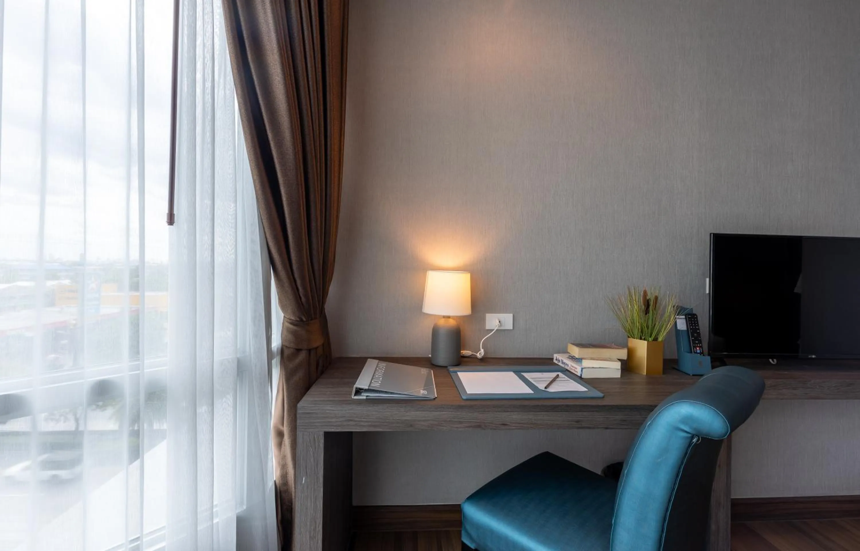 TV and multimedia in Siam Mandarina Hotel - Free BKK Airport Shuttle