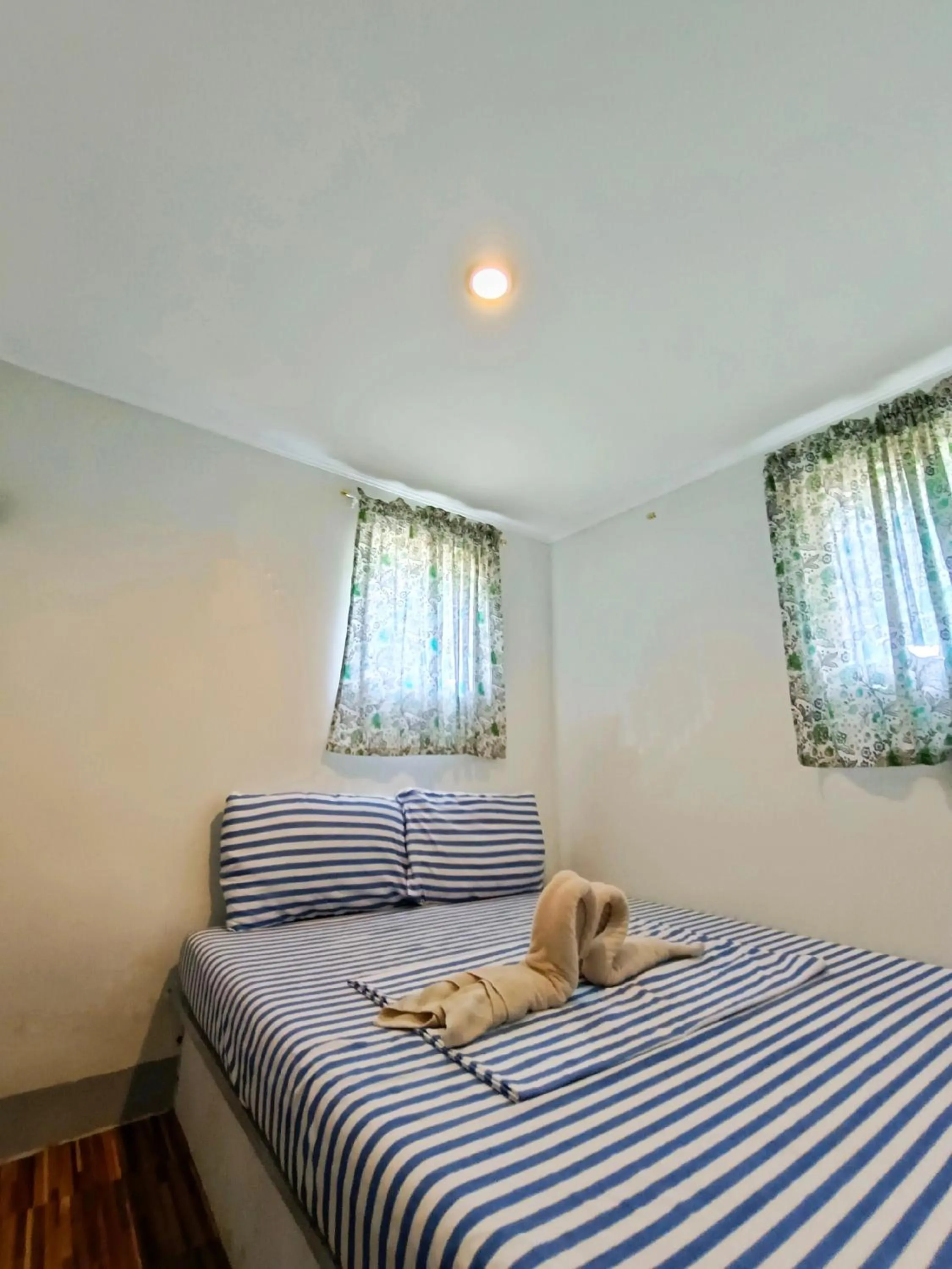 Bed in Ander Divers Garden Resort