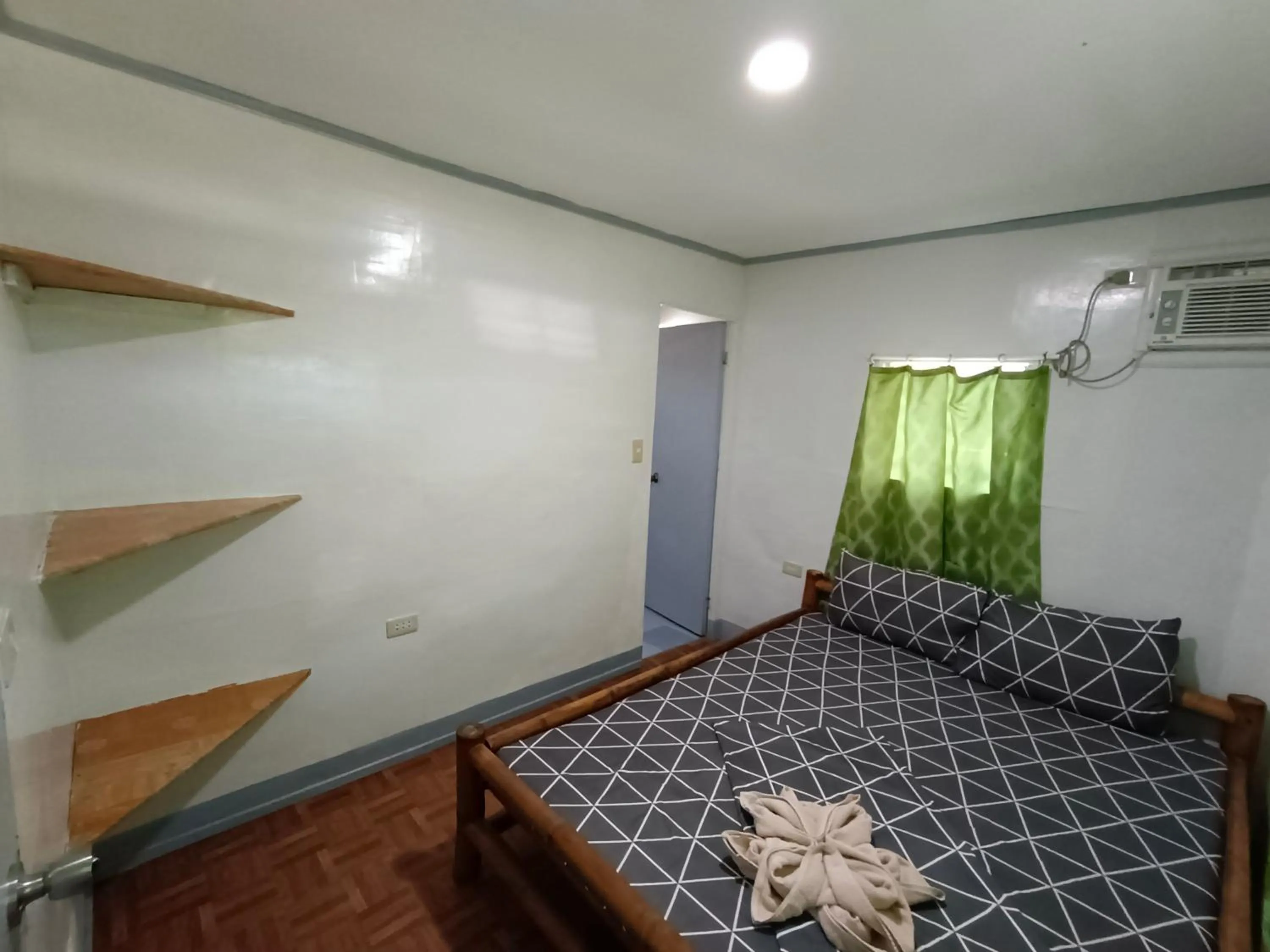 Bed in Ander Divers Garden Resort