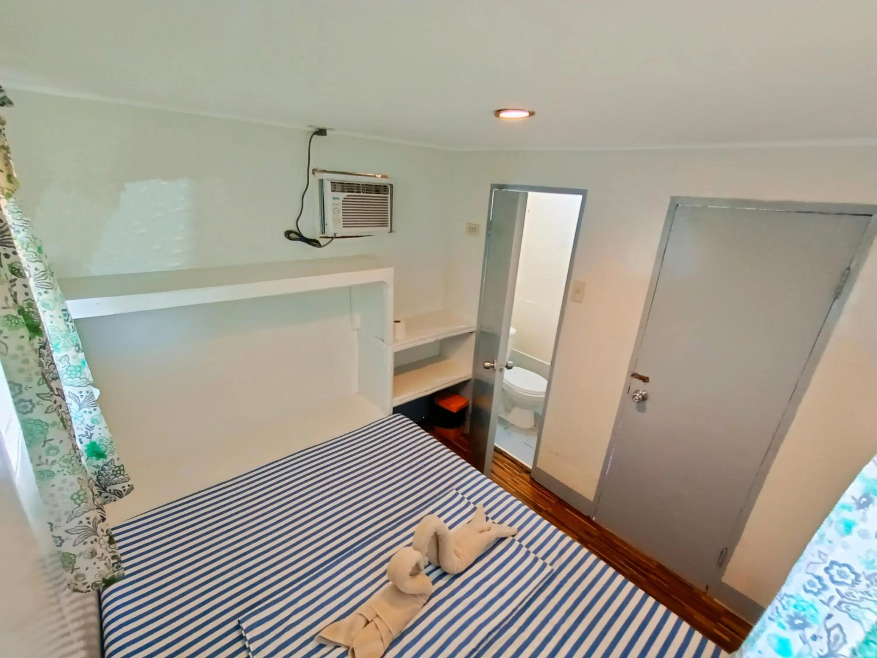 Bed in Ander Divers Garden Resort